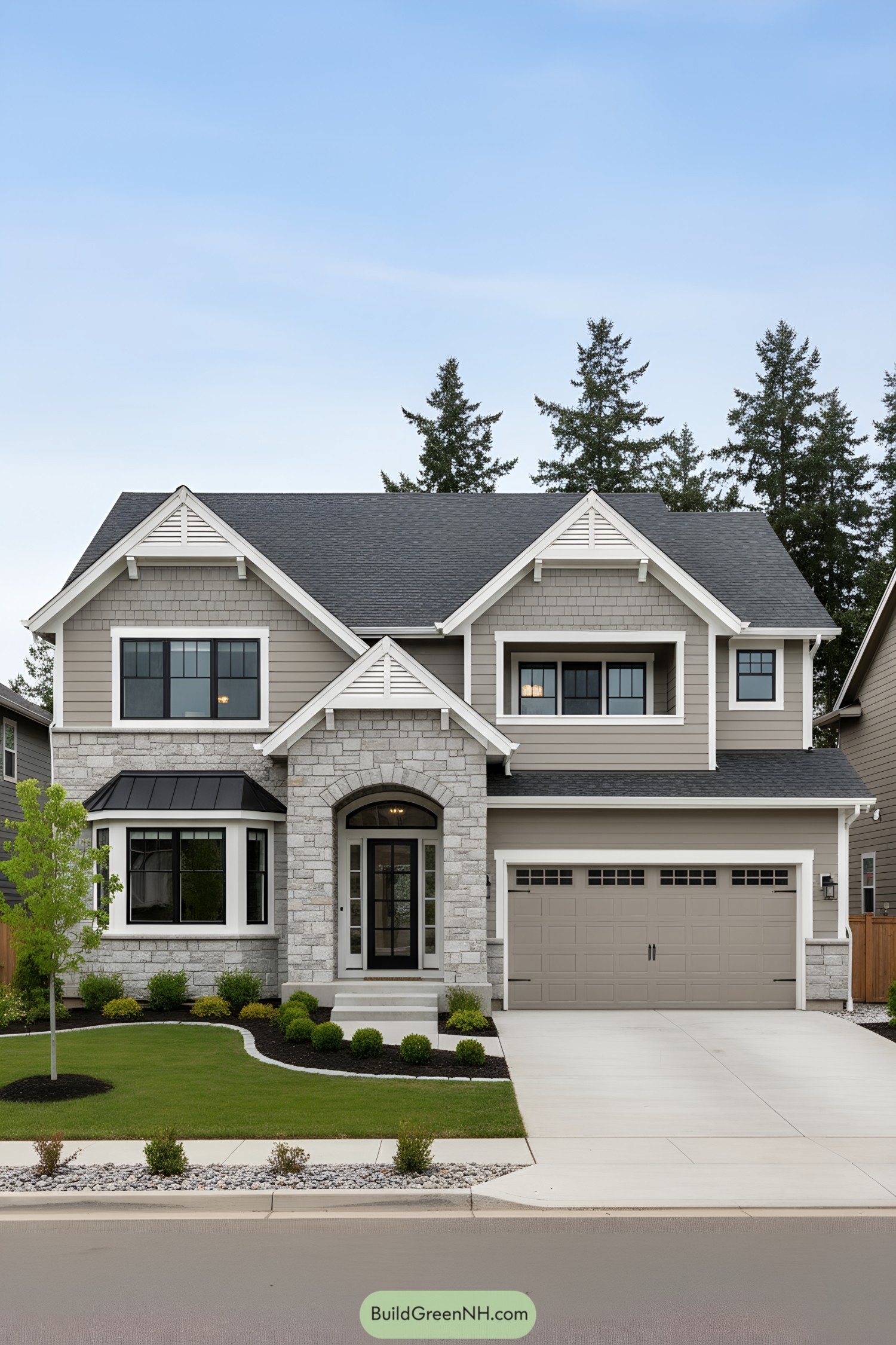 Two-story suburban home with stone entry, gray siding, and gabled roof
