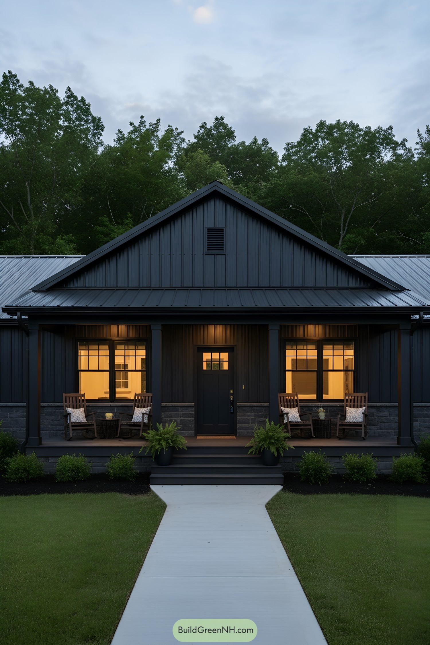 Black metal barndo with warm porch lights