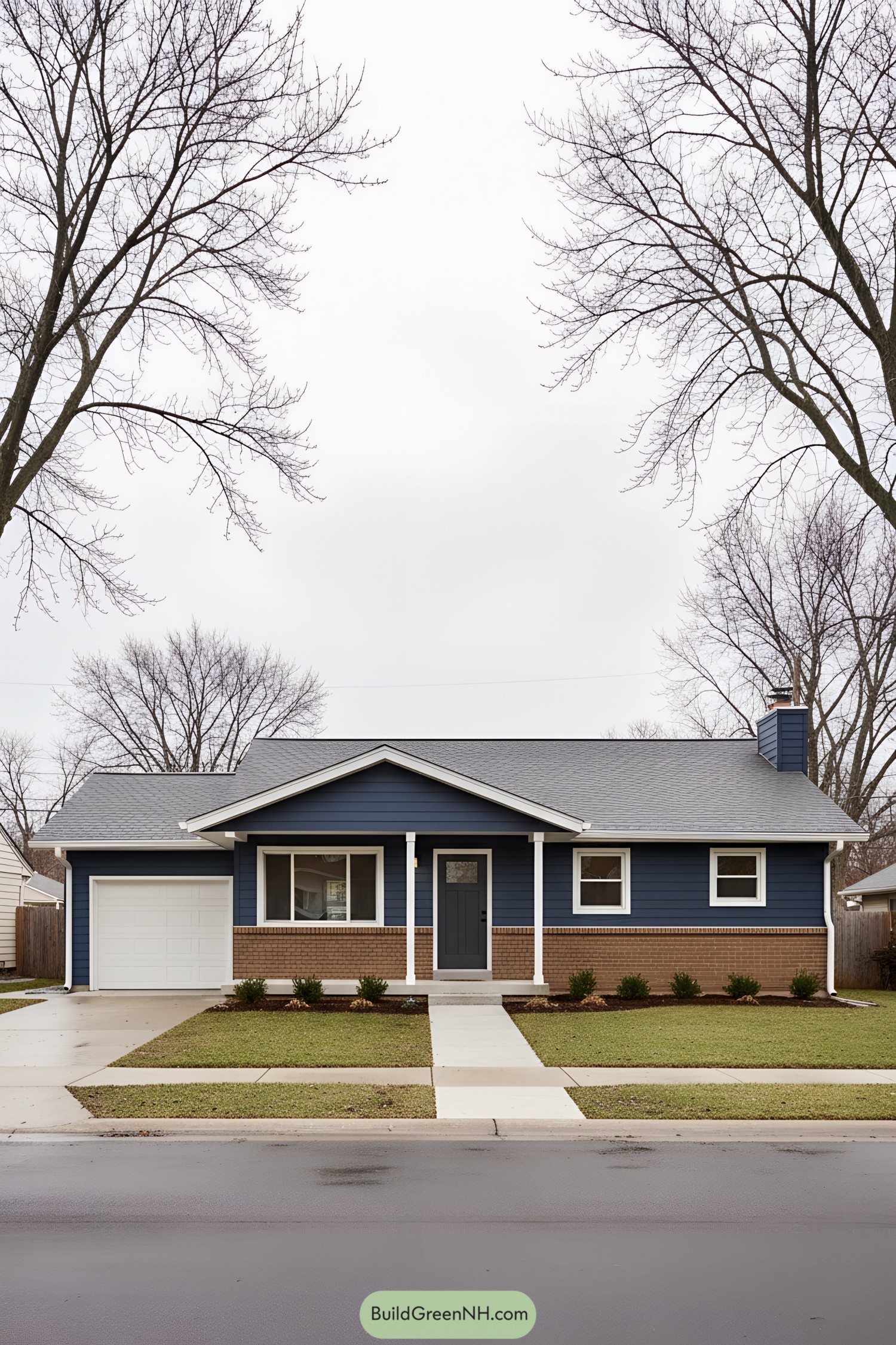 Navy ranch house with brick wainscot and gable porch