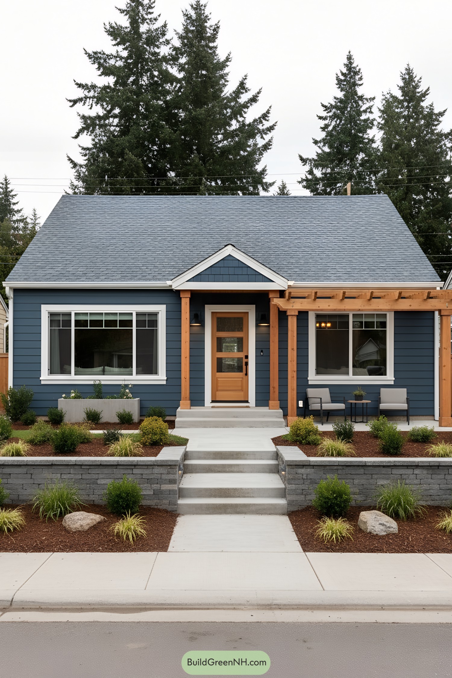 Blue ranch house with cedar accents and pergola