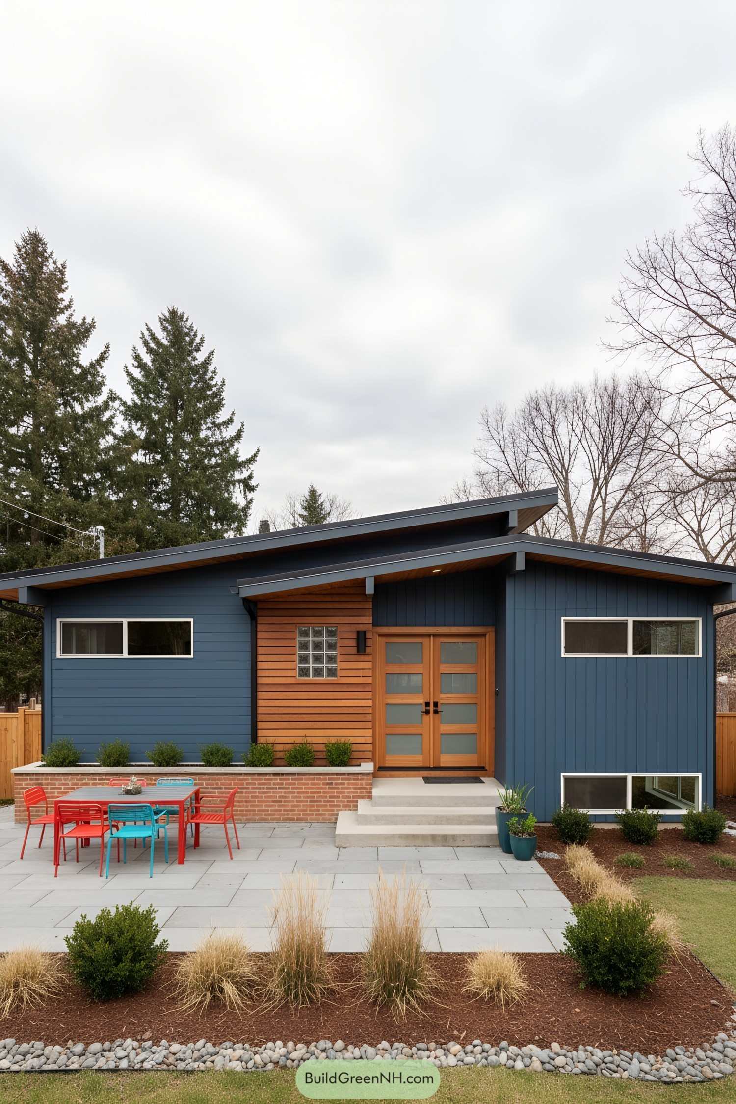 Blue midcentury ranch with cedar accents and sloped roof