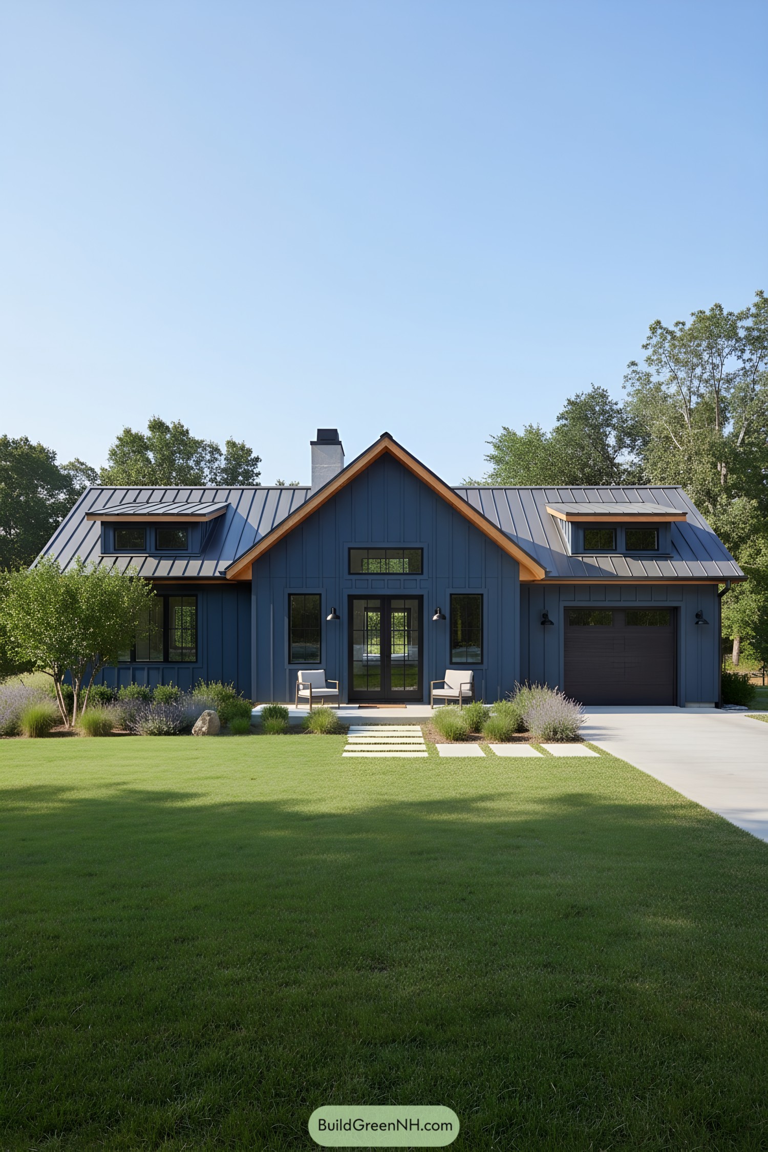 Blue ranch house with metal roof and dormers