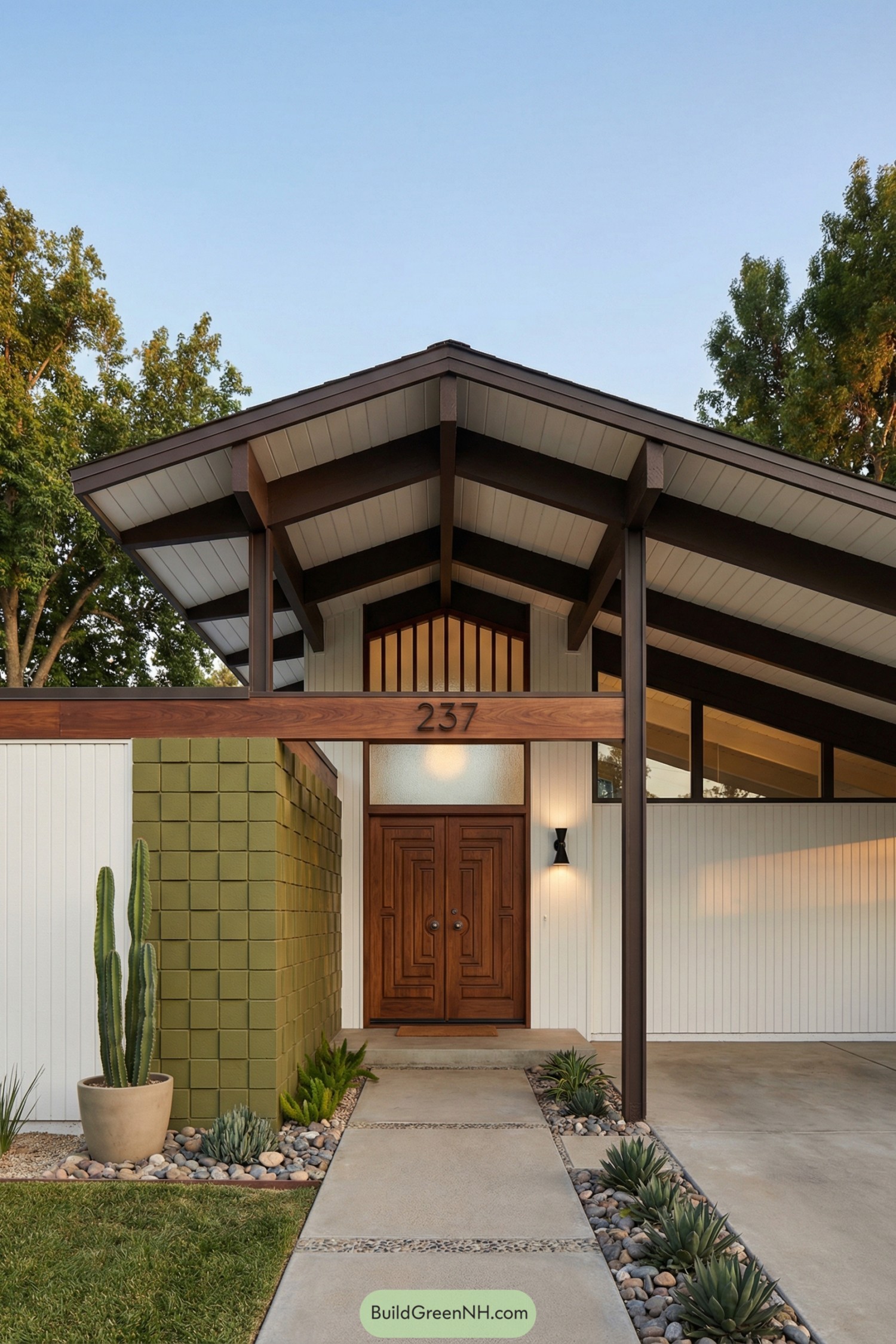 Midcentury entry with olive block wall and gabled canopy
