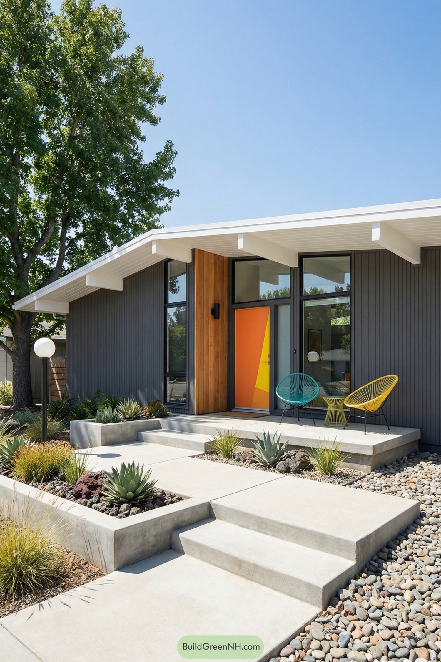 Midcentury home with colorful door and xeriscaped entry