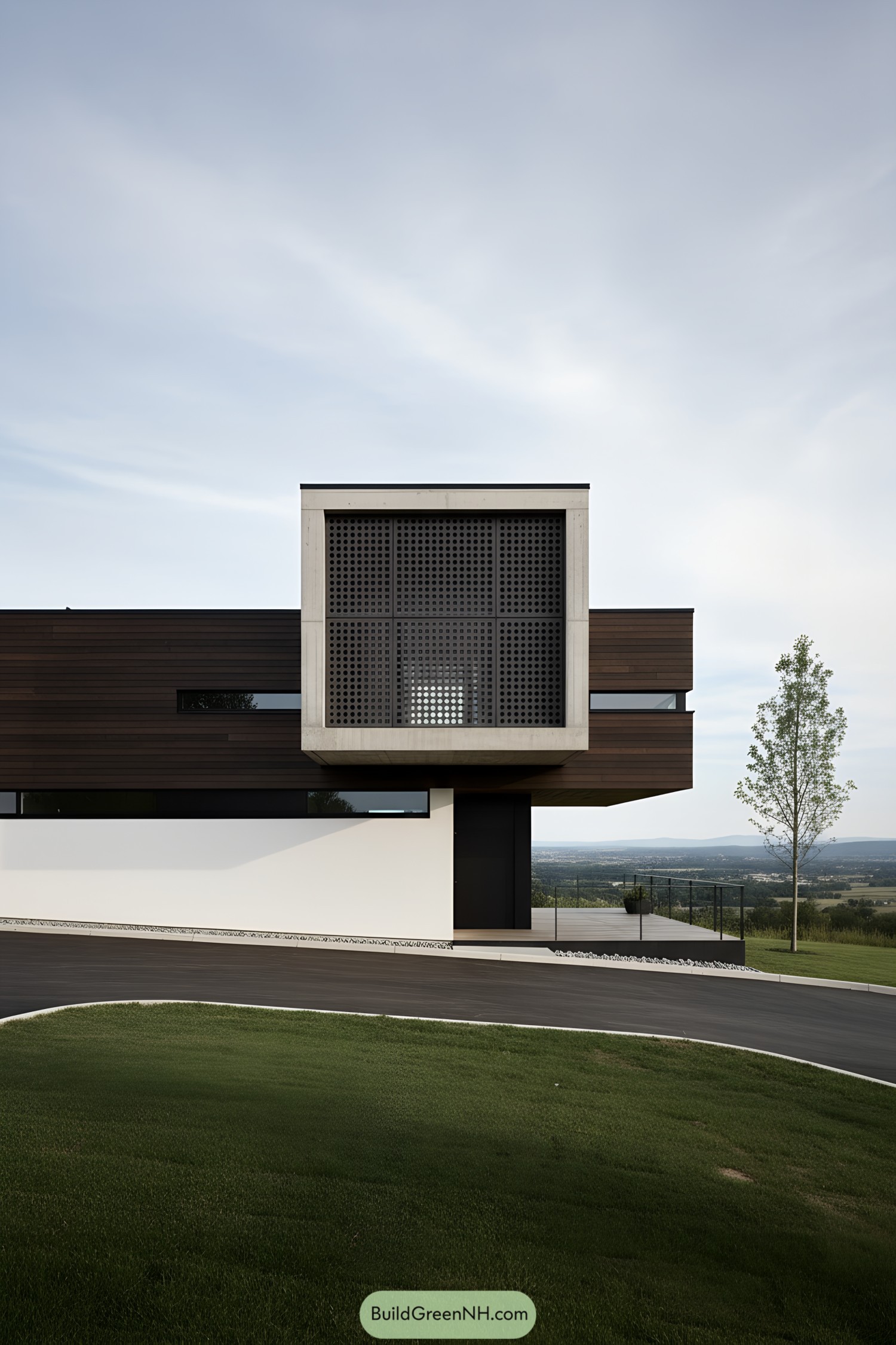 Modern hillside home with cantilevered perforated cube facade