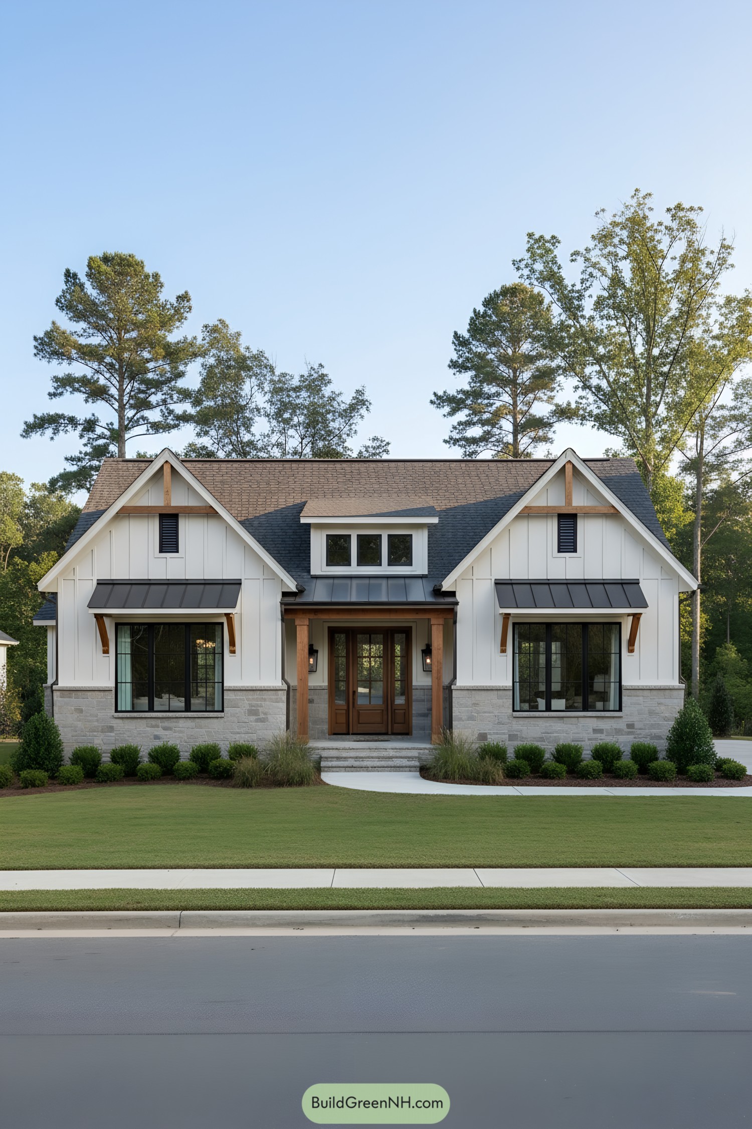 White board-and-batten ranch with stone base, metal awnings, and wood-trimmed porch