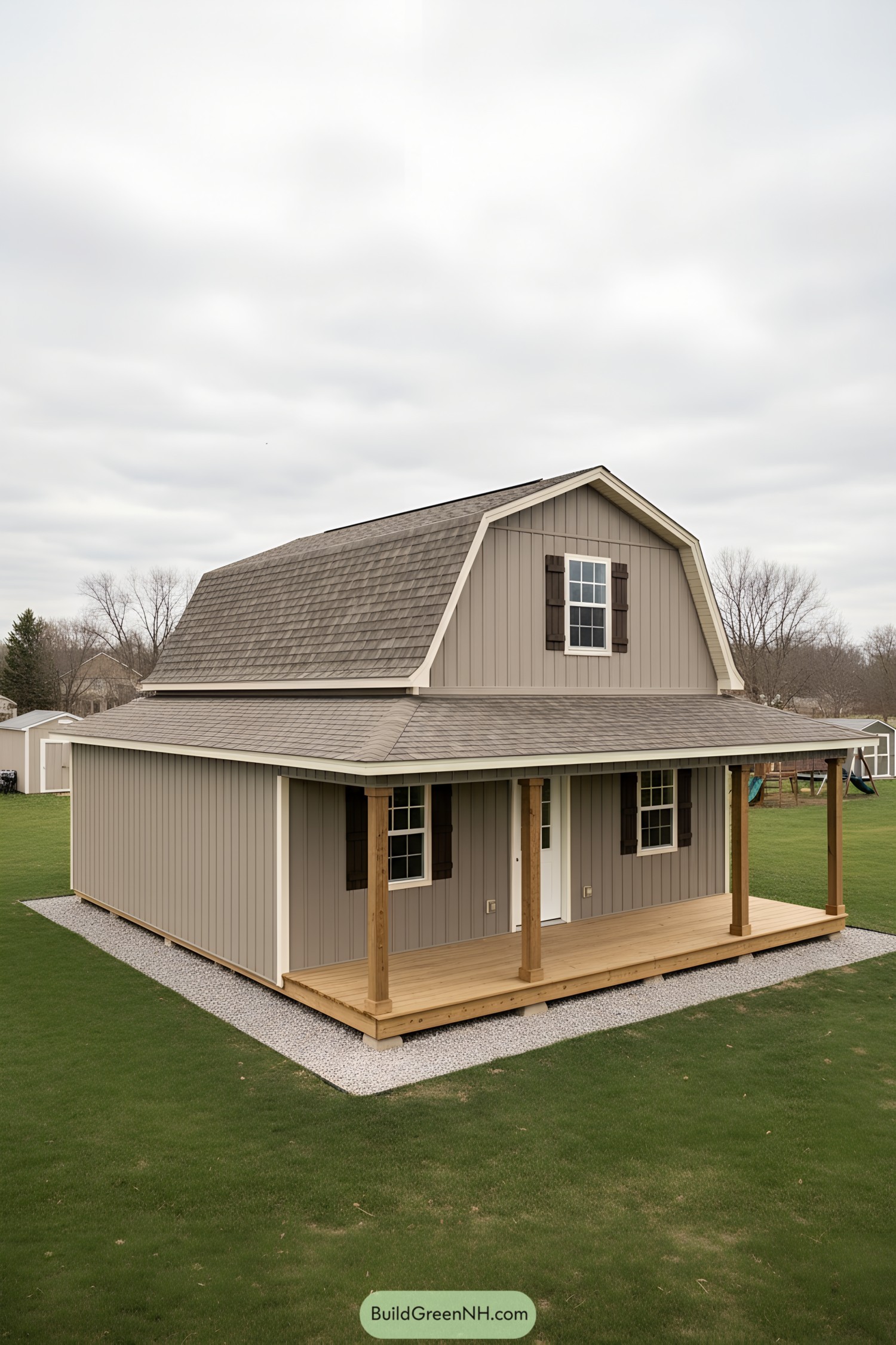 Two-story gambrel shed house with wraparound porch