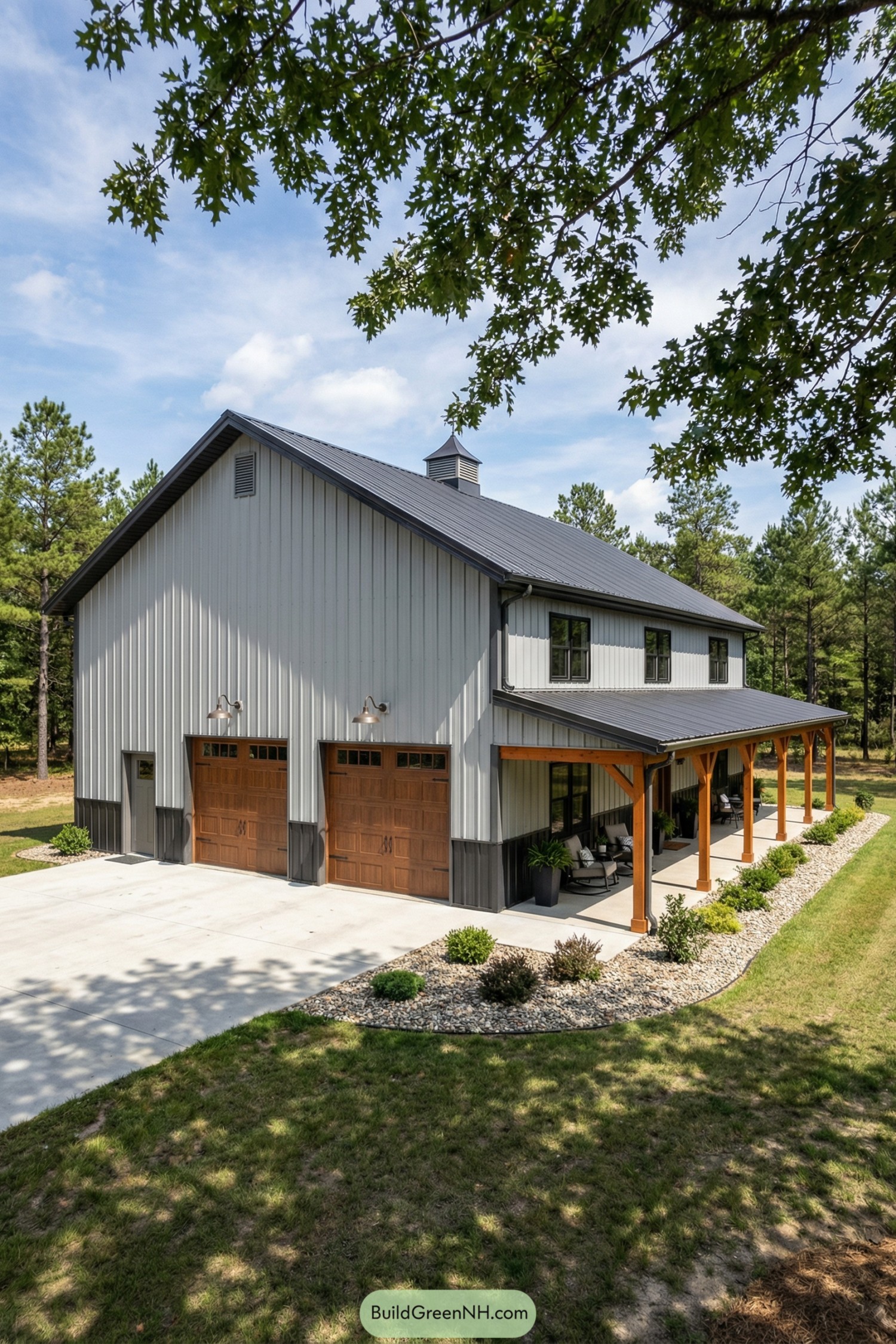 Metal barndominium with cedar posts and dual wood garage doors