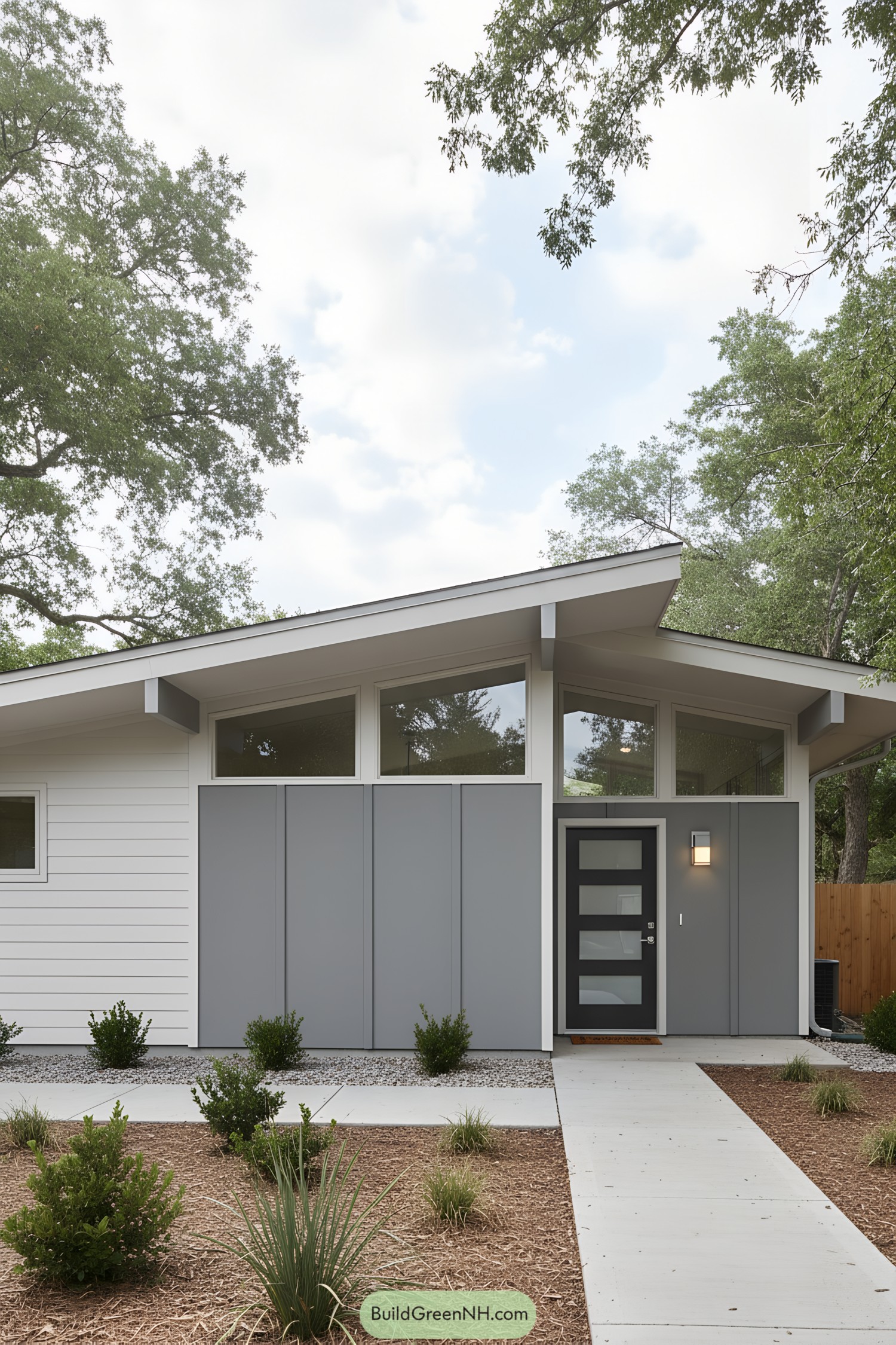Gray paneled facade with clerestory windows