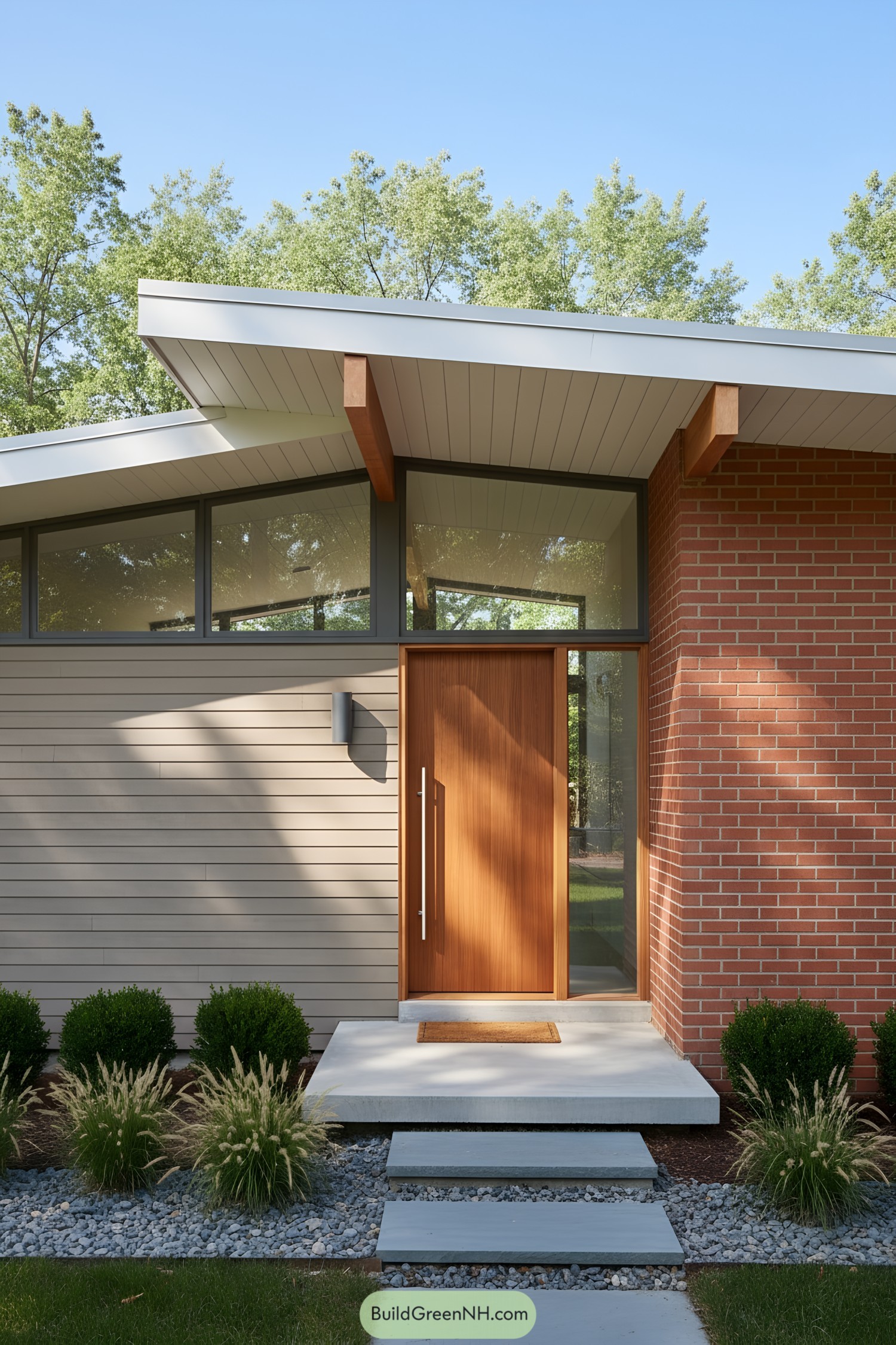 Mid-century entry with cedar door, brick and horizontal siding under a splayed roof