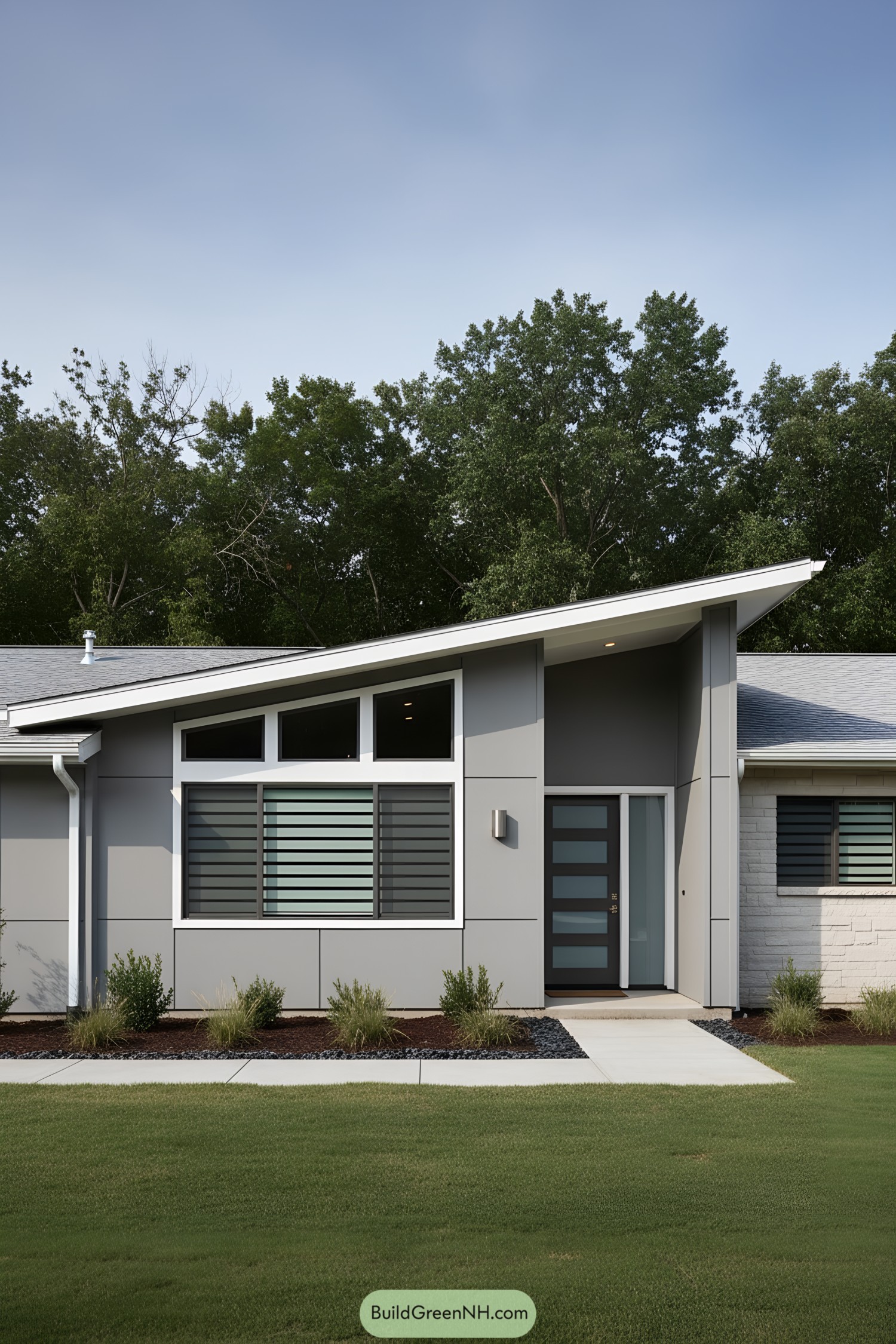 Angular gray ranch facade with slanted roof and horizontal window louvers