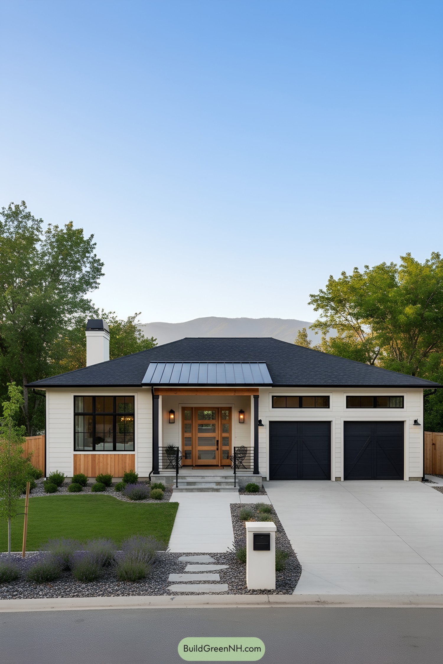 Modern ranch home with black eaves, white siding, and a warm wood entry
