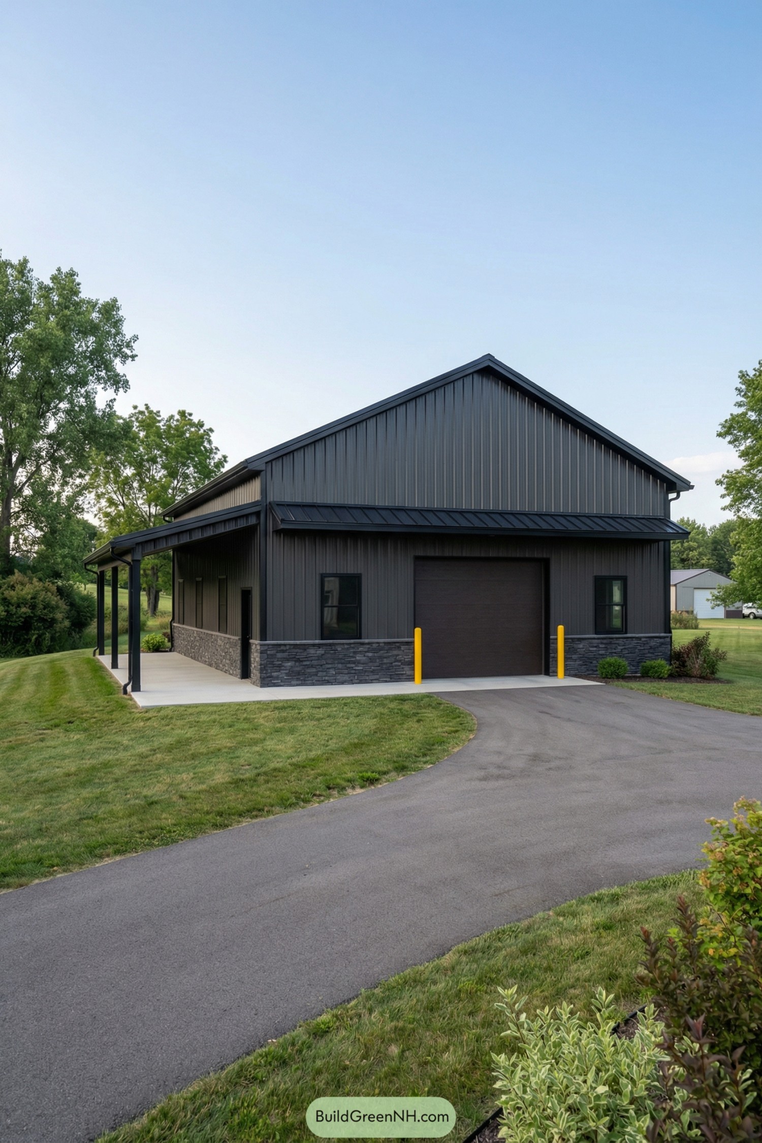 Dark metal pole barn with side porch and single garage bay