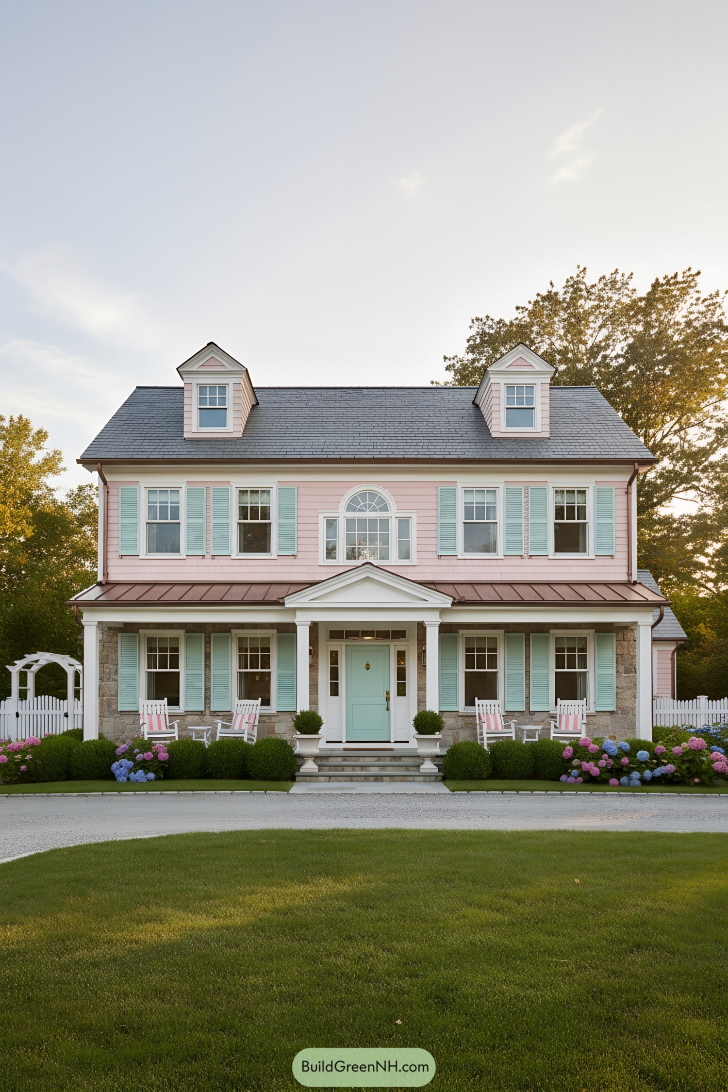 Pastel colonial home with aqua shutters and copper porch roof