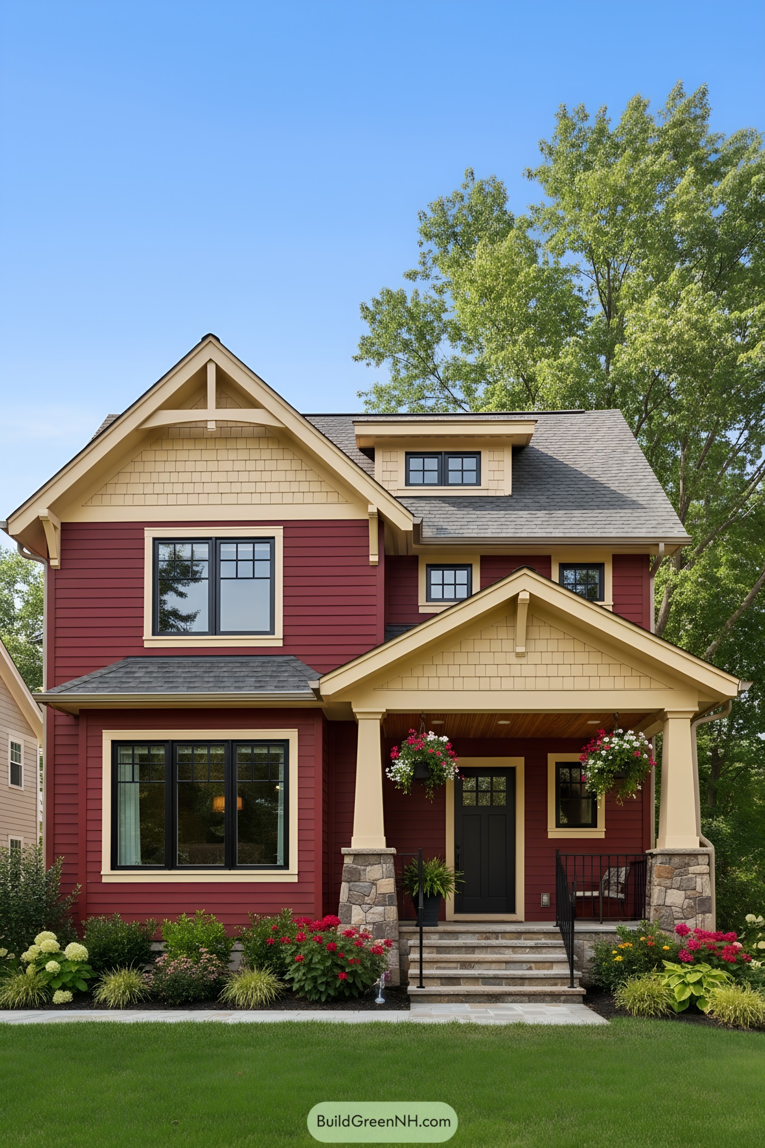 Red Craftsman house with cream trim and stone porch