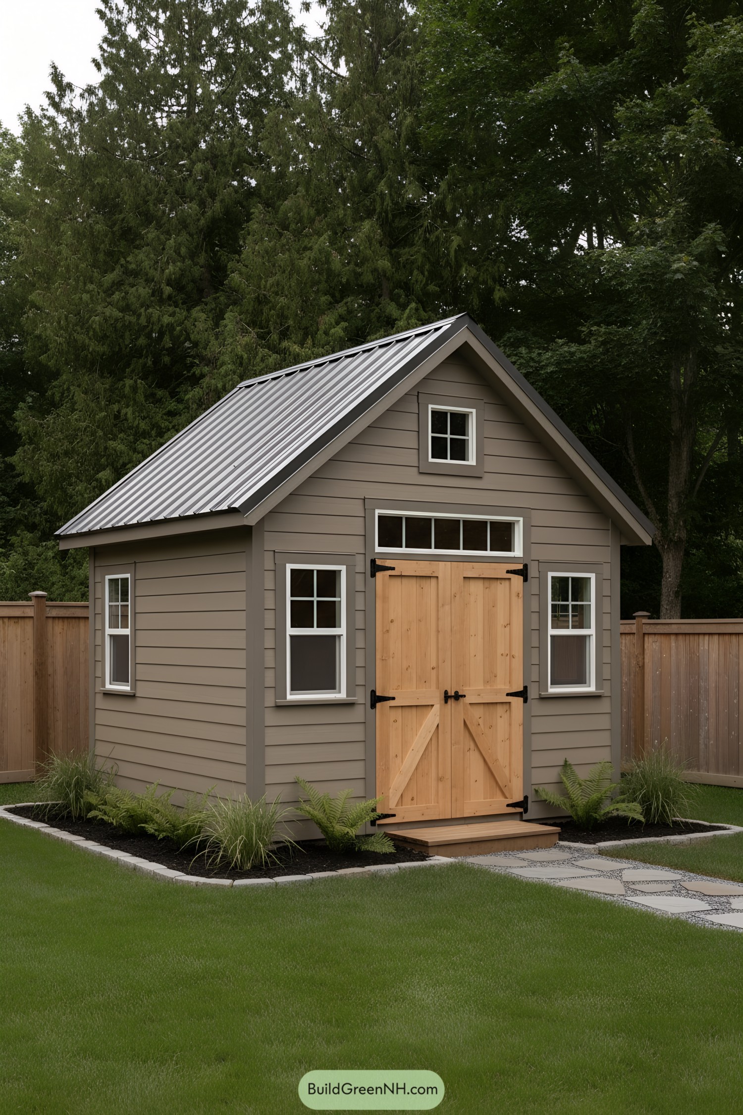 Small gable-roof shed with loft windows and cedar double doors