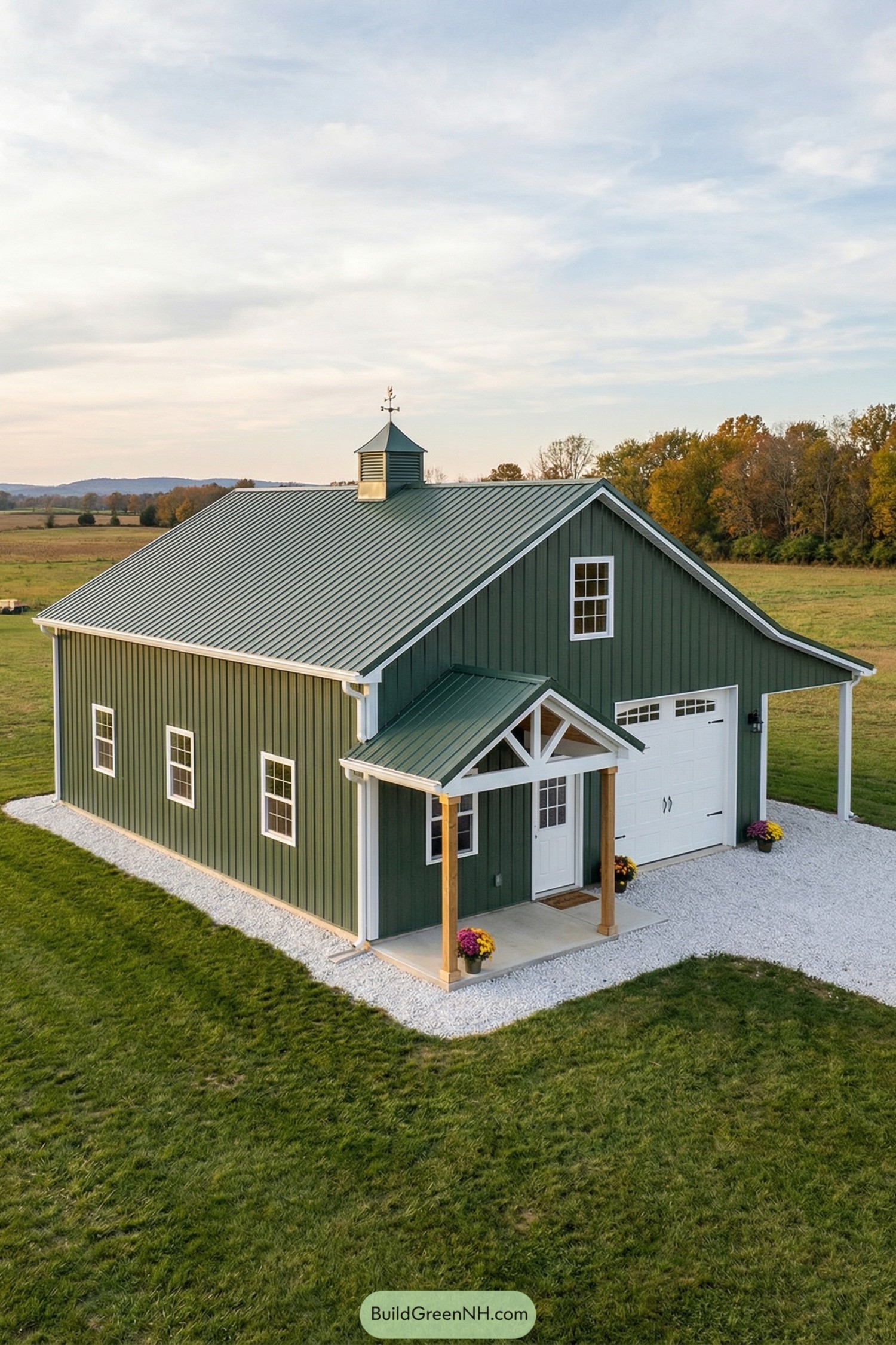 Small green barndo with gable porch and garage