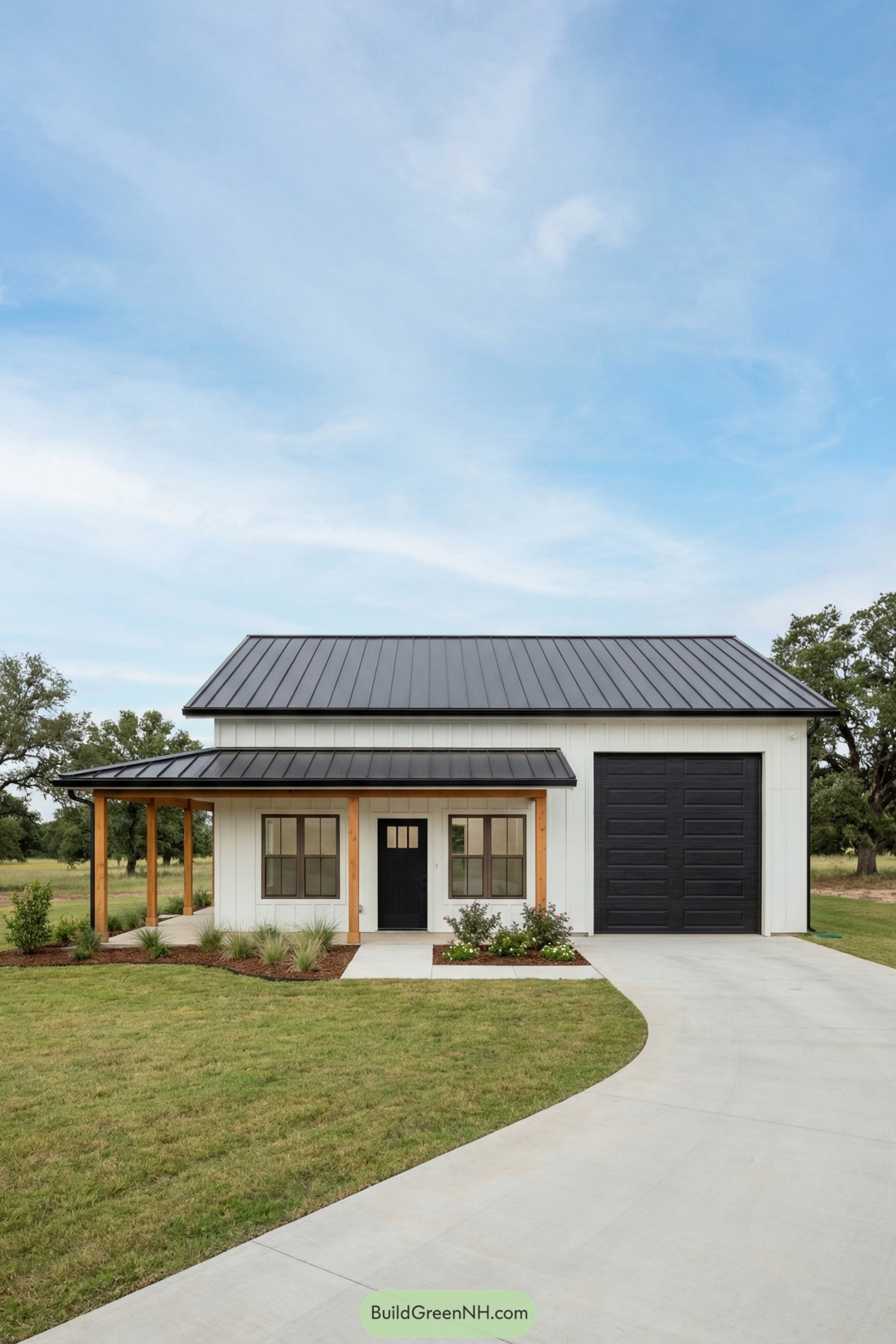 Compact white barndo with black roof and garage