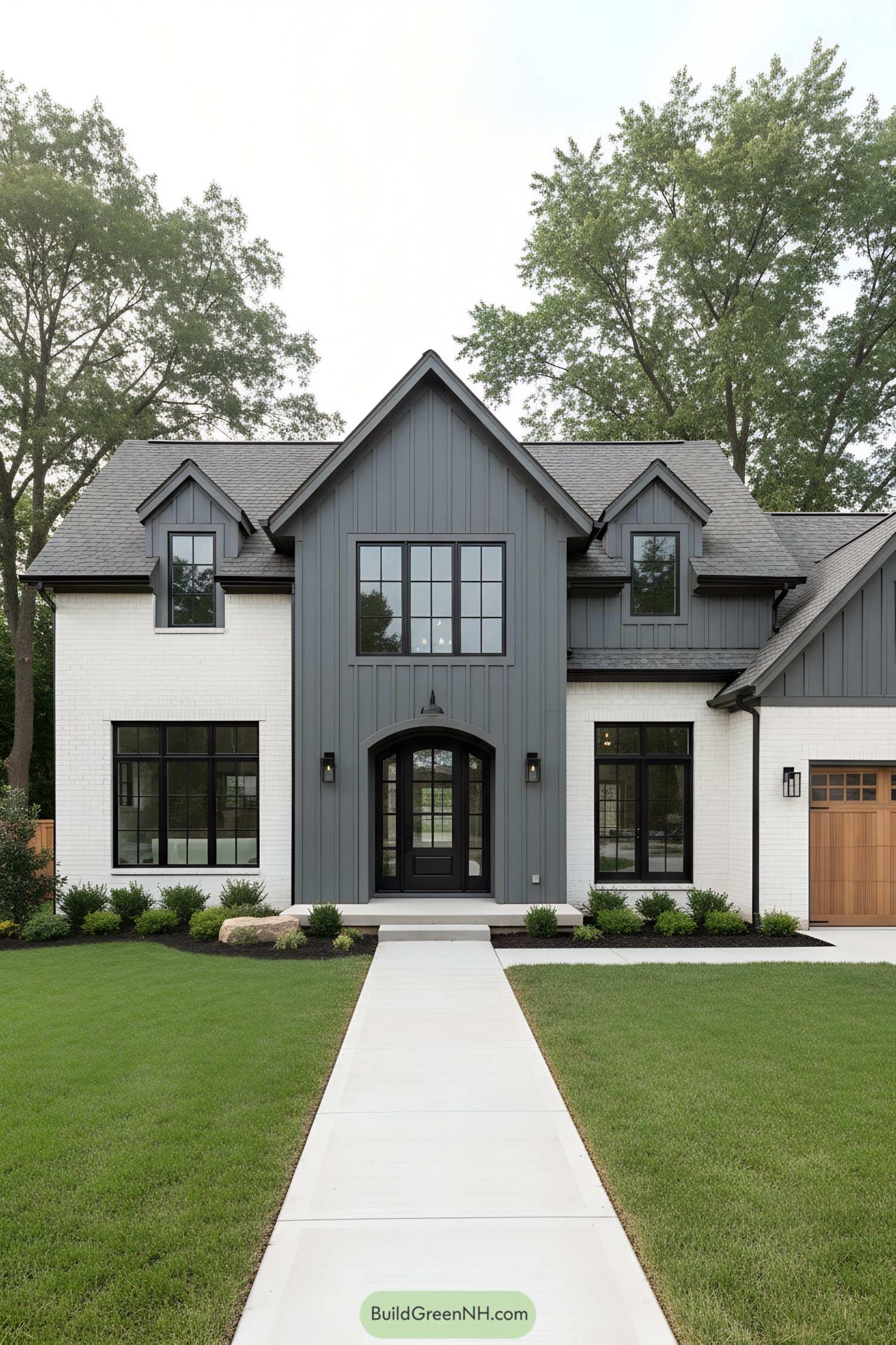 Two-story gray-and-white farmhouse with black windows