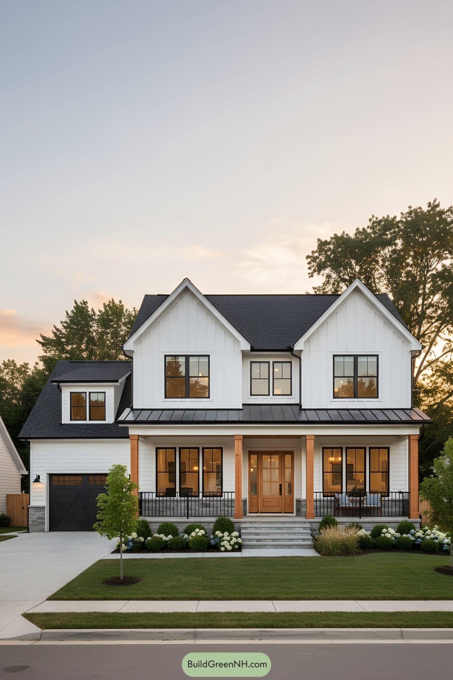 White board-and-batten farmhouse with black windows, metal porch roof, and warm wood columns