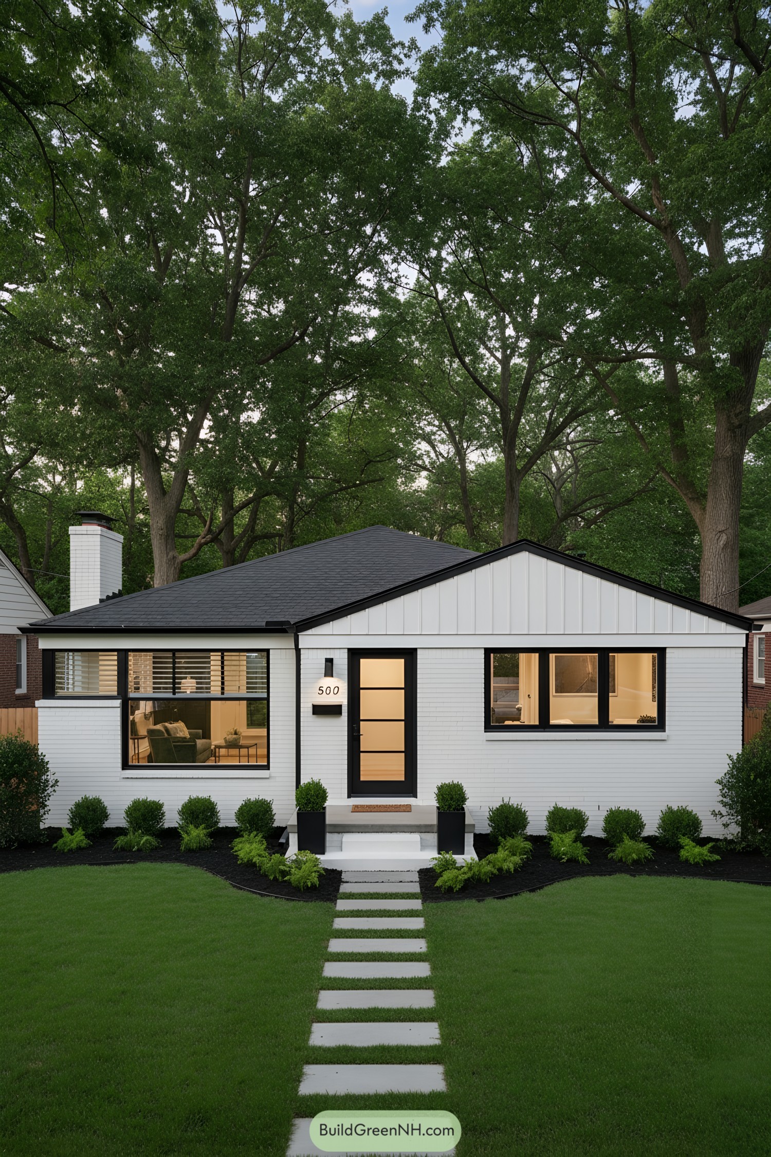 White brick ranch with black trim large windows and a stepping-stone path