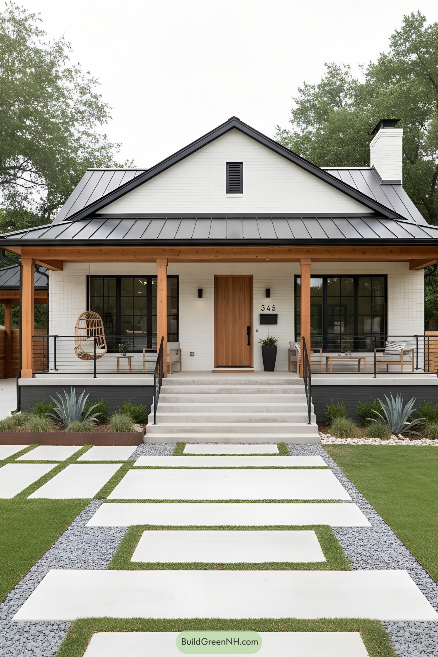 White brick ranch with black metal roof and cedar accents