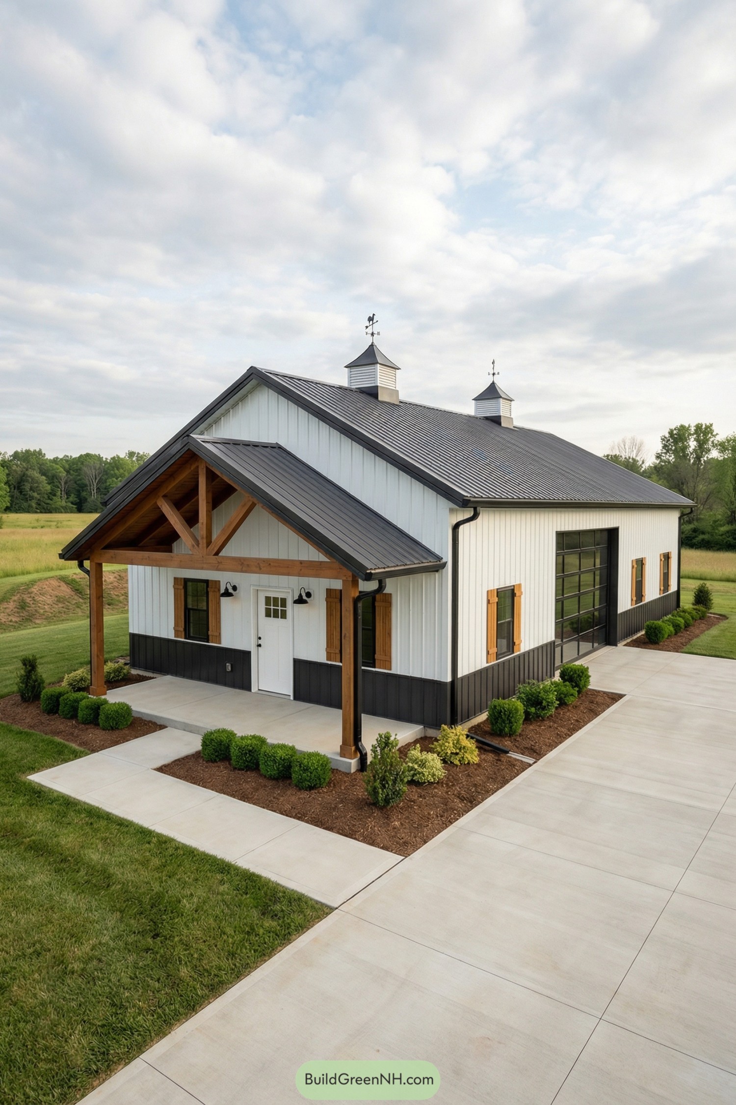 White pole barn with timber porch and black wainscot