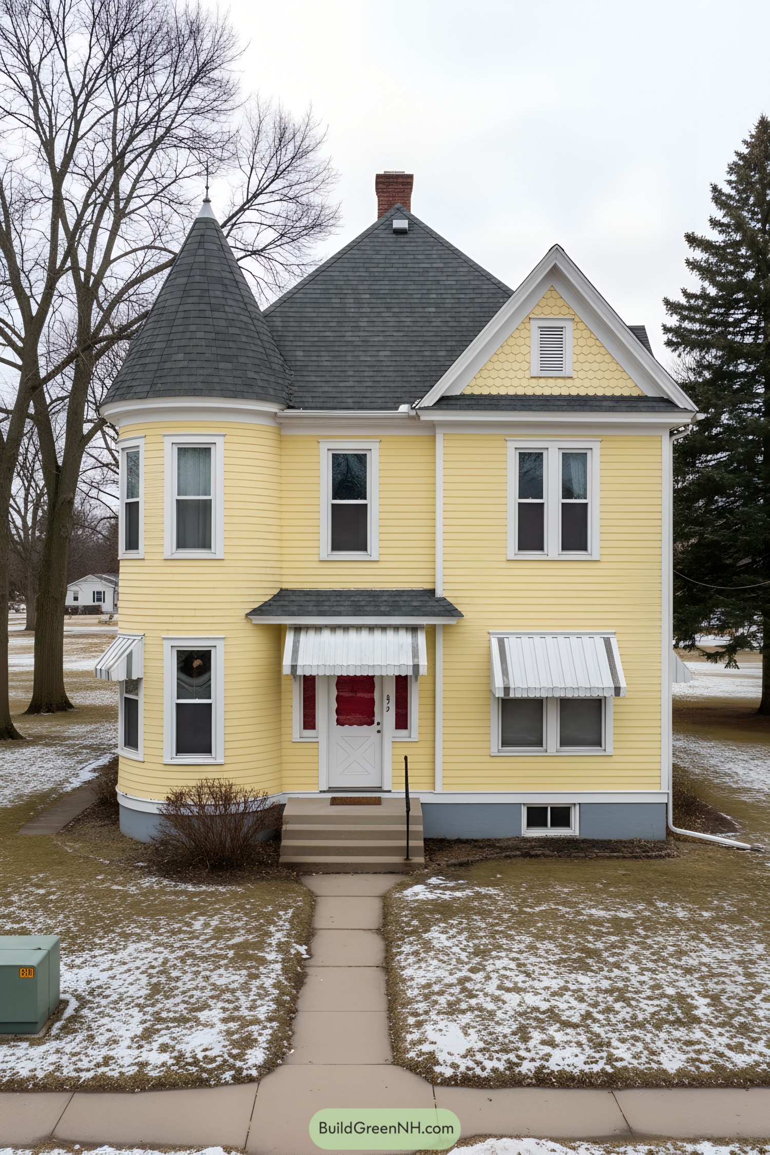 Yellow Victorian with turret and awnings