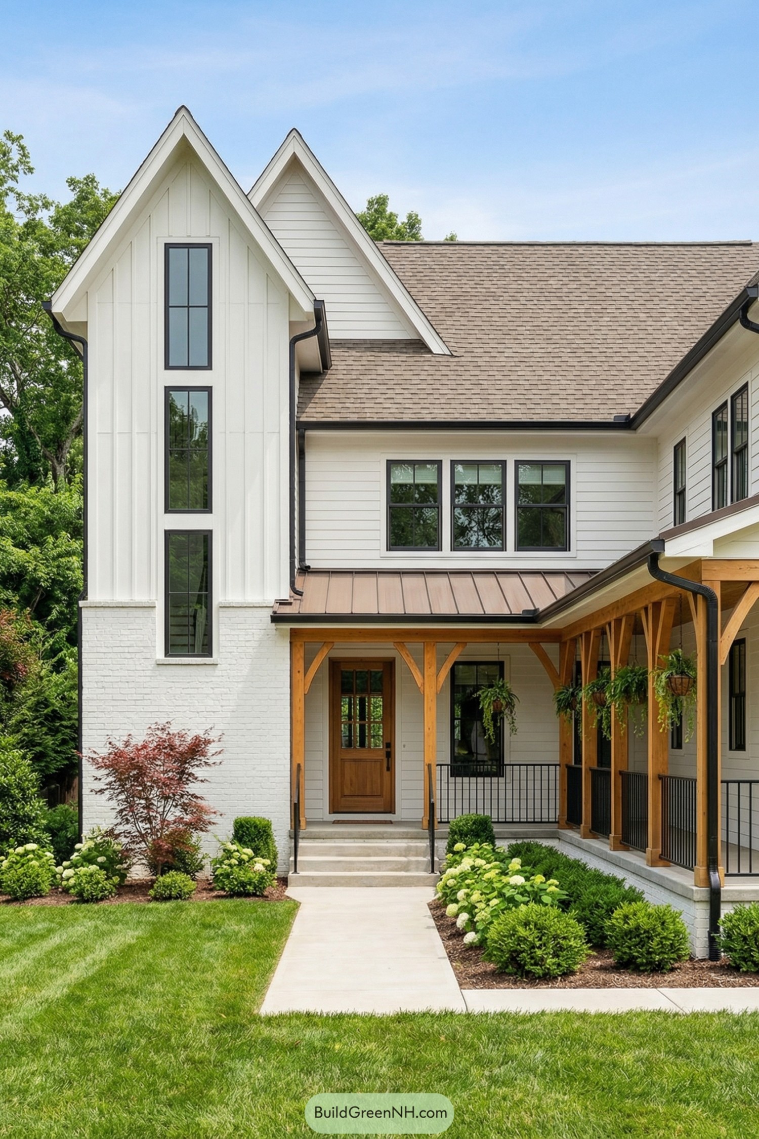 Modern farmhouse with tall gables and warm wood porch