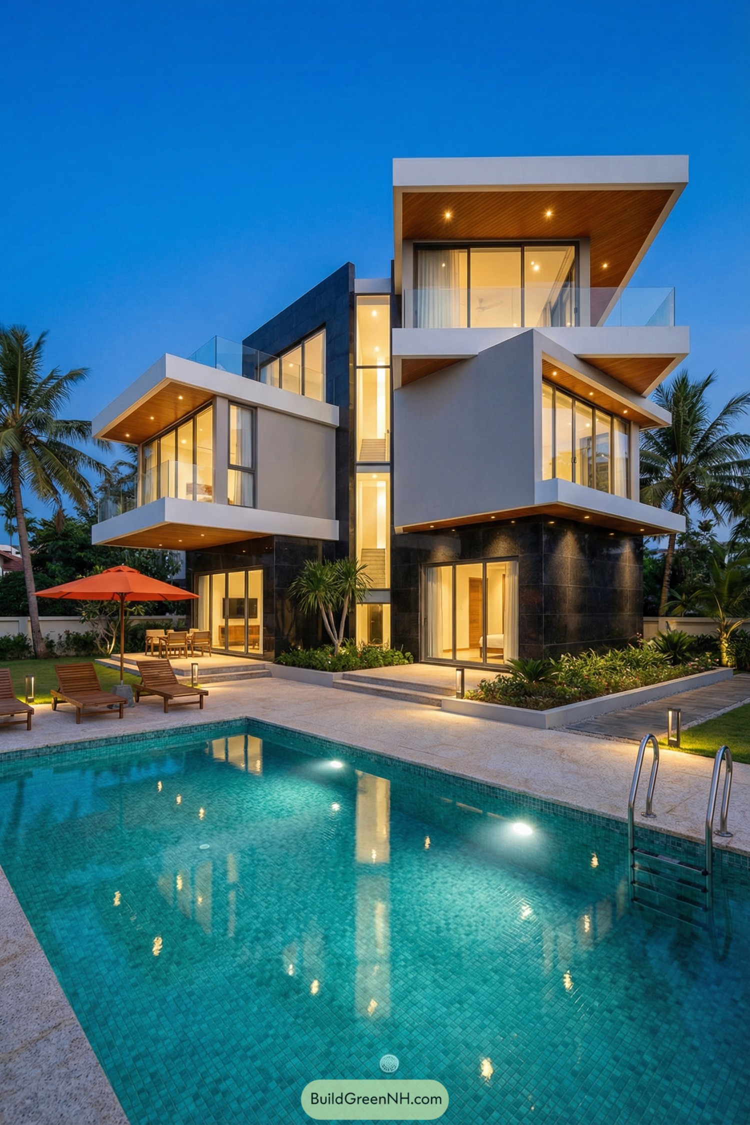 Modern three story villa with cantilevered glass boxes overlooking a turquoise pool at dusk. Lounge chairs and palm trees frame the illuminated water