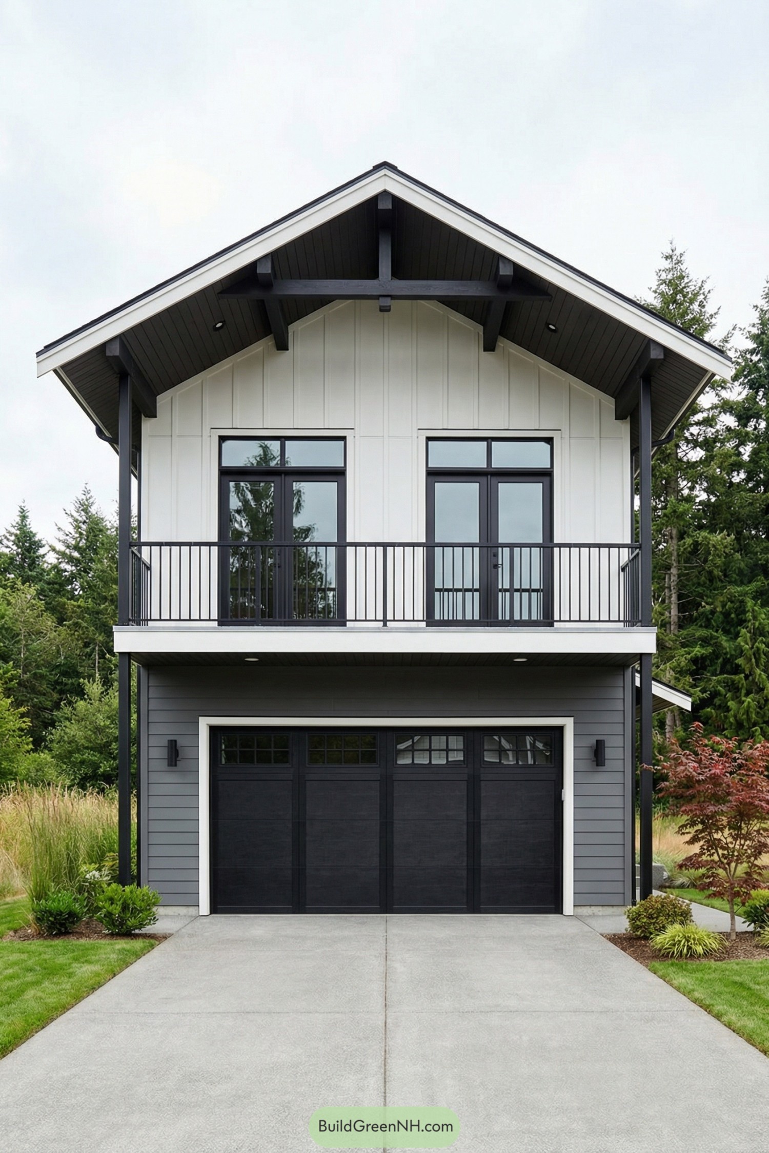 Two-story gray and white garage with upper balcony and black doors