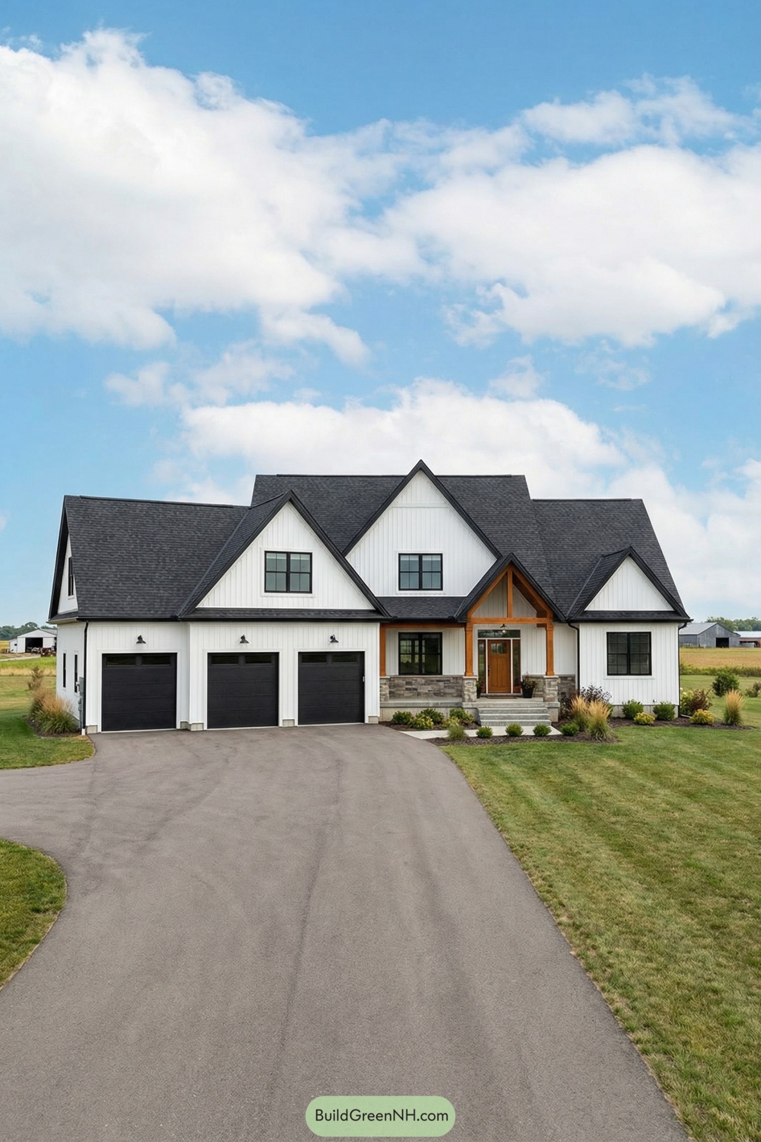 White modern farmhouse with three-car black garage doors and gabled roof
