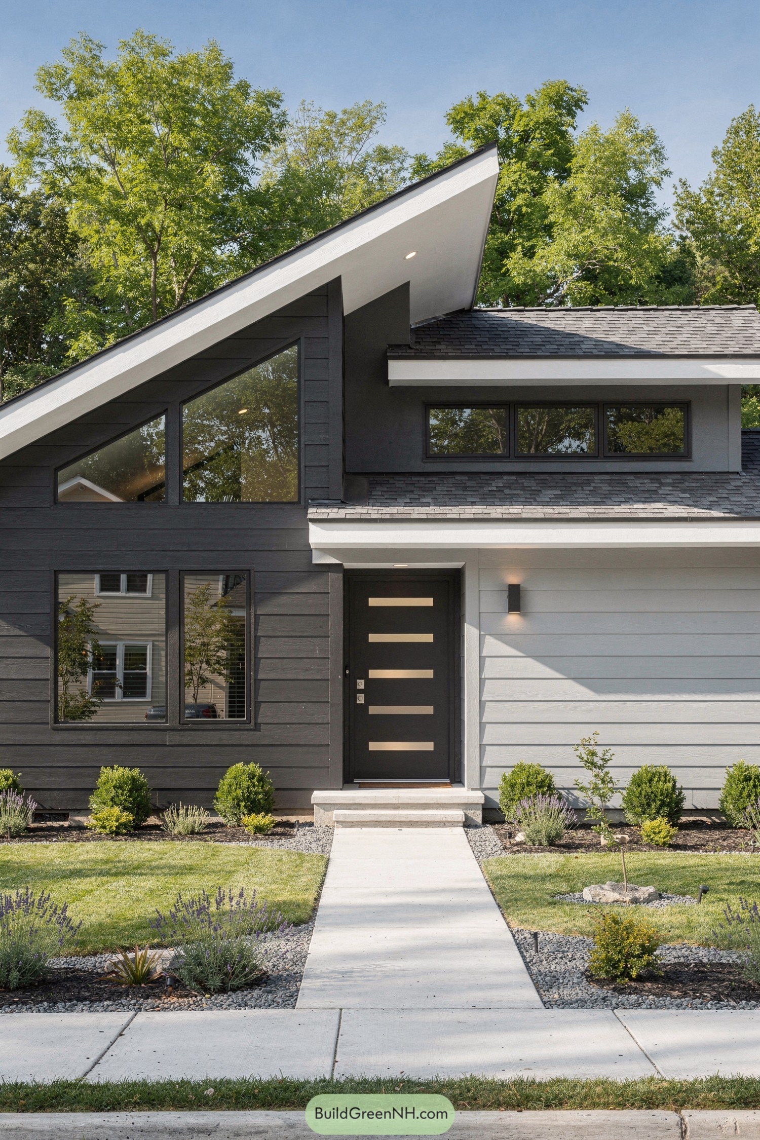 Modern house with dark and light horizontal siding, sloped roofline, and minimalist landscaping