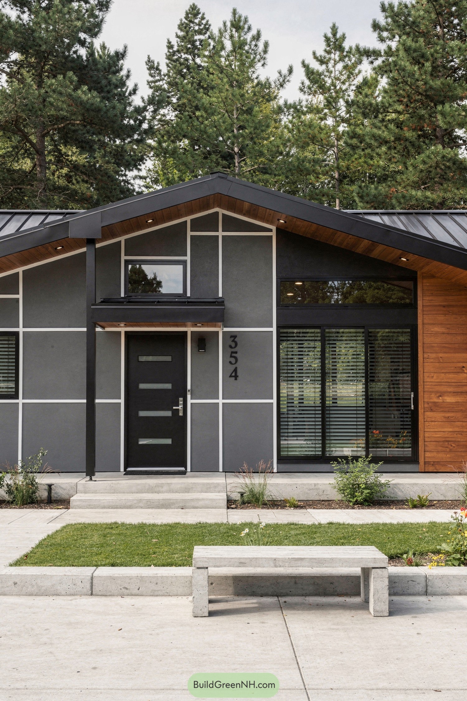 Modern gray and wood house facade with geometric siding and large windows