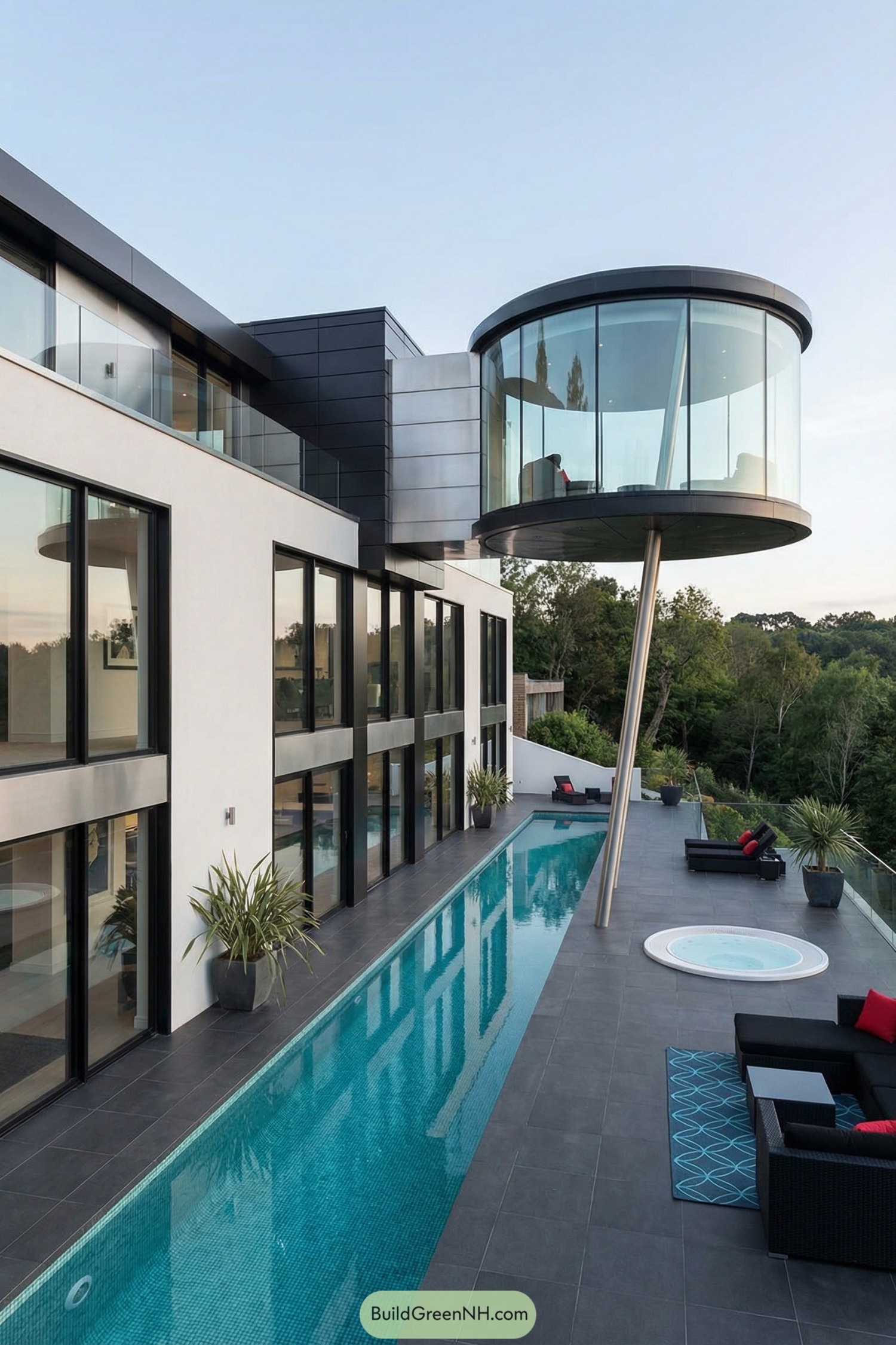 Modern hillside home with glass capsule room over a narrow lap pool