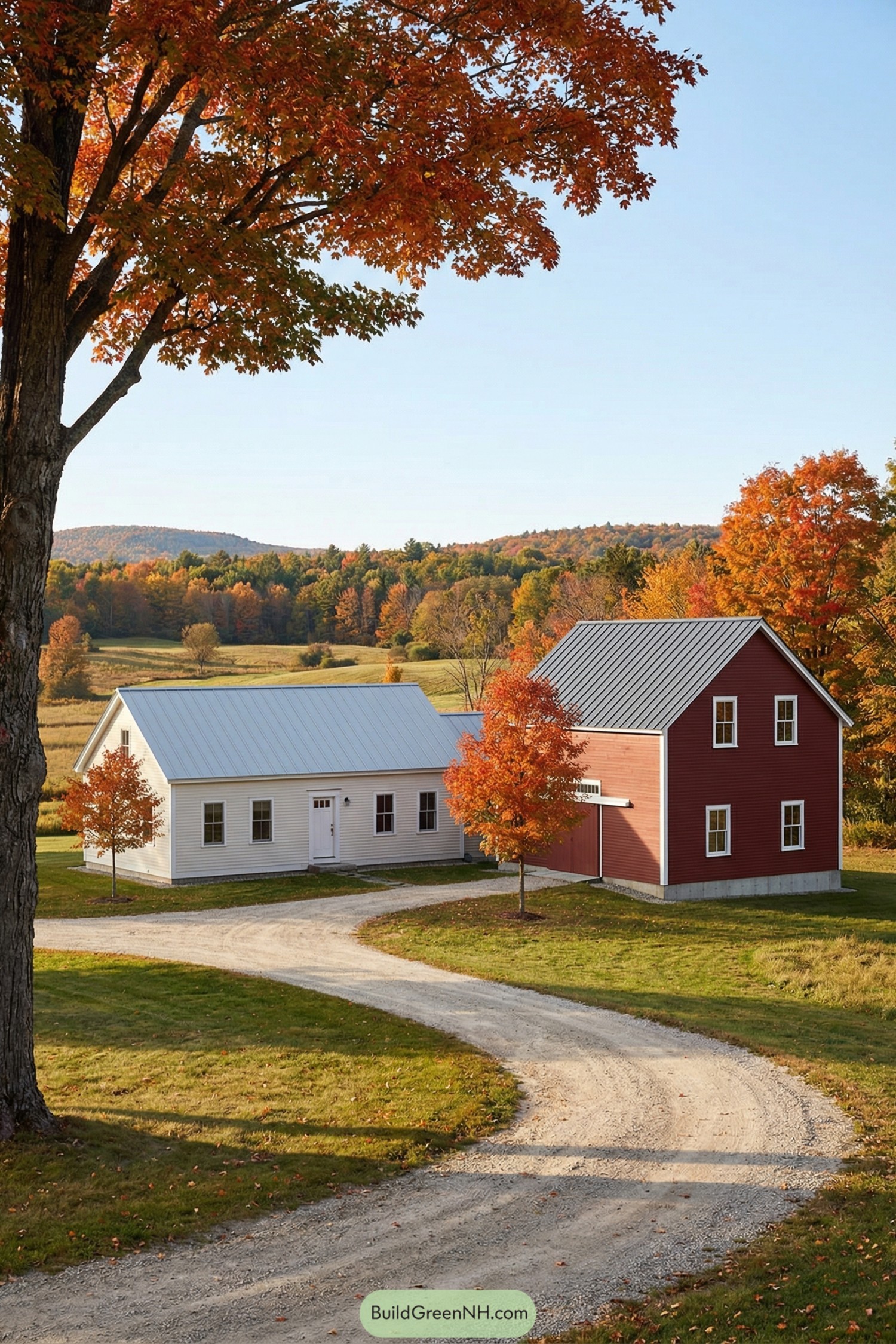 Red and white farmhouse-style buildings on a curving gravel drive surrounded by fall foliage