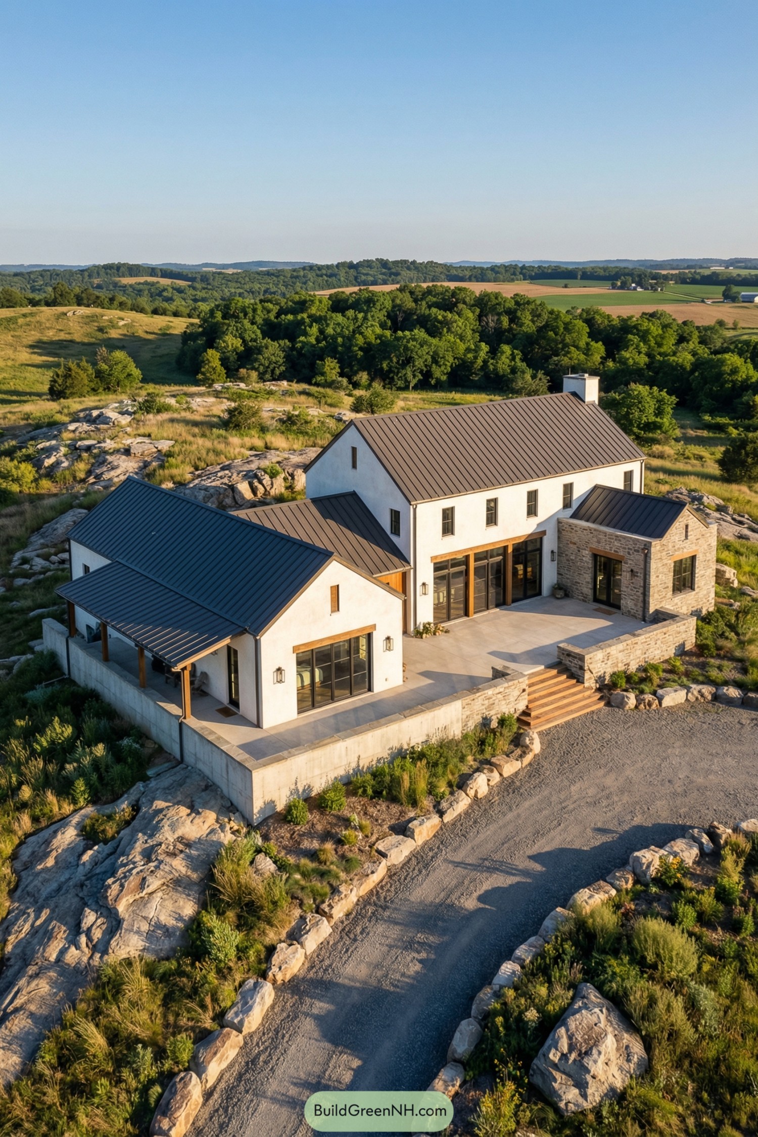 Modern farmhouse estate on a rocky rural ridge