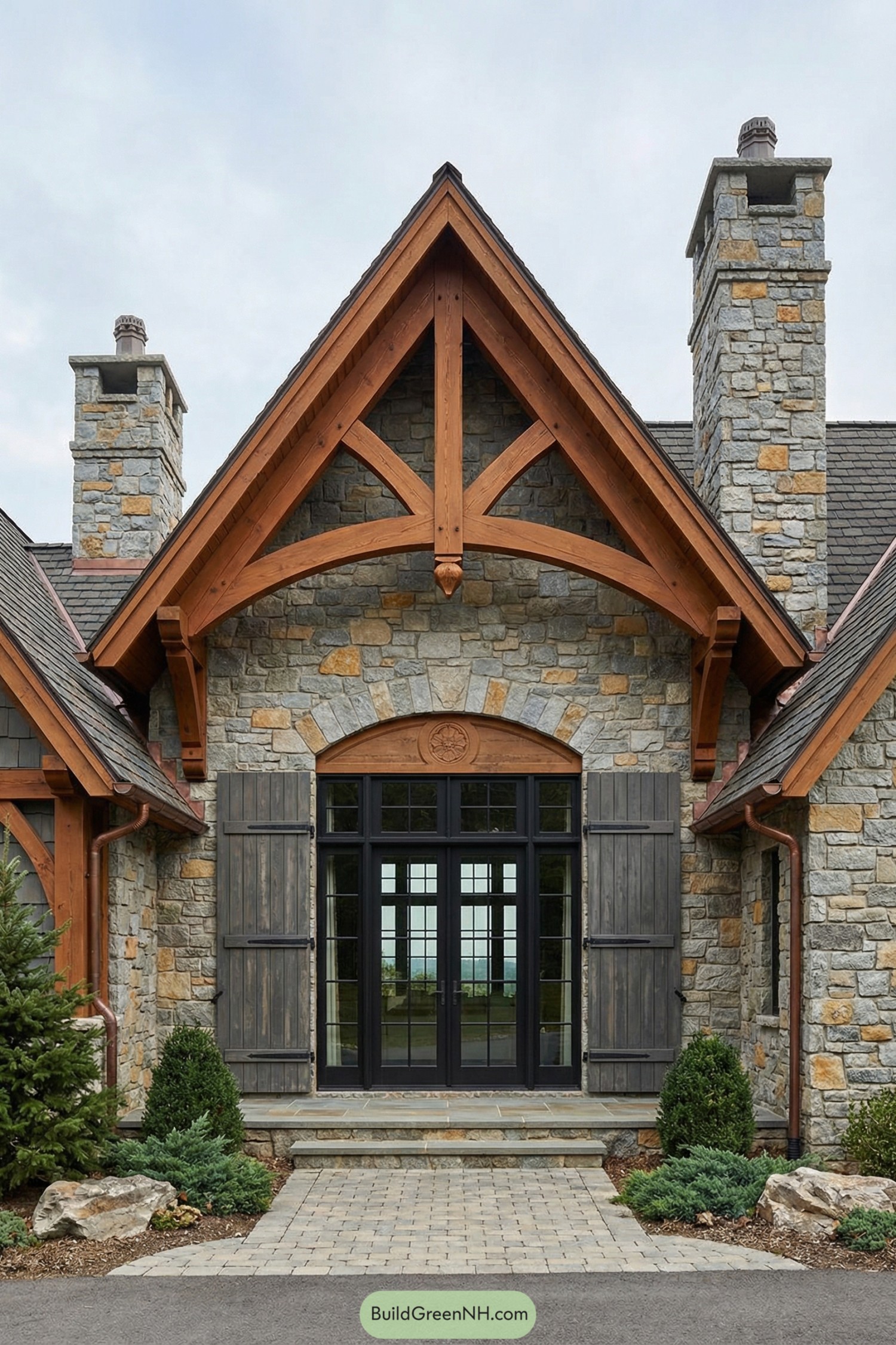 Stone house entry with timber truss gable