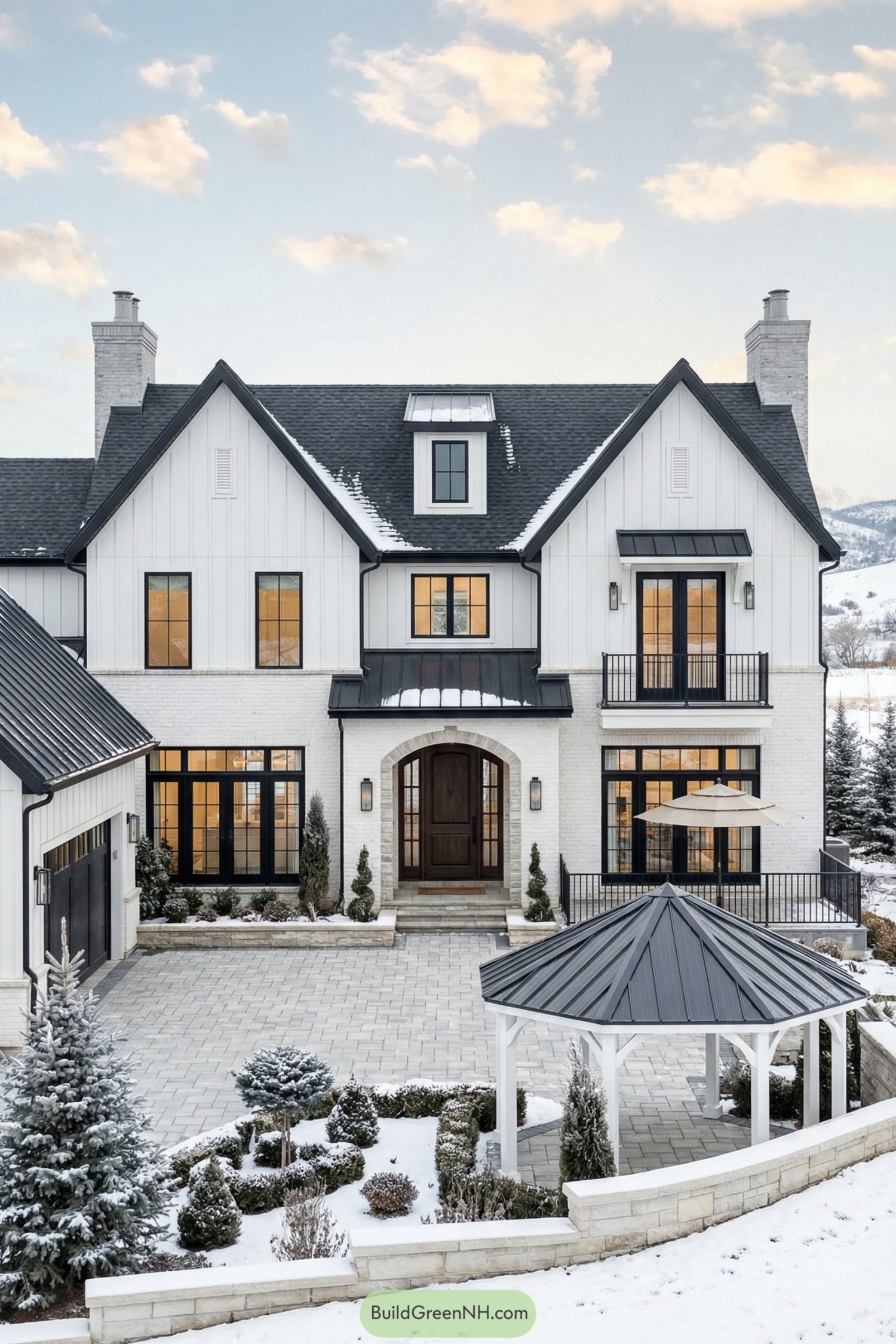 Modern farmhouse-style winter mansion with black roof and front gazebo