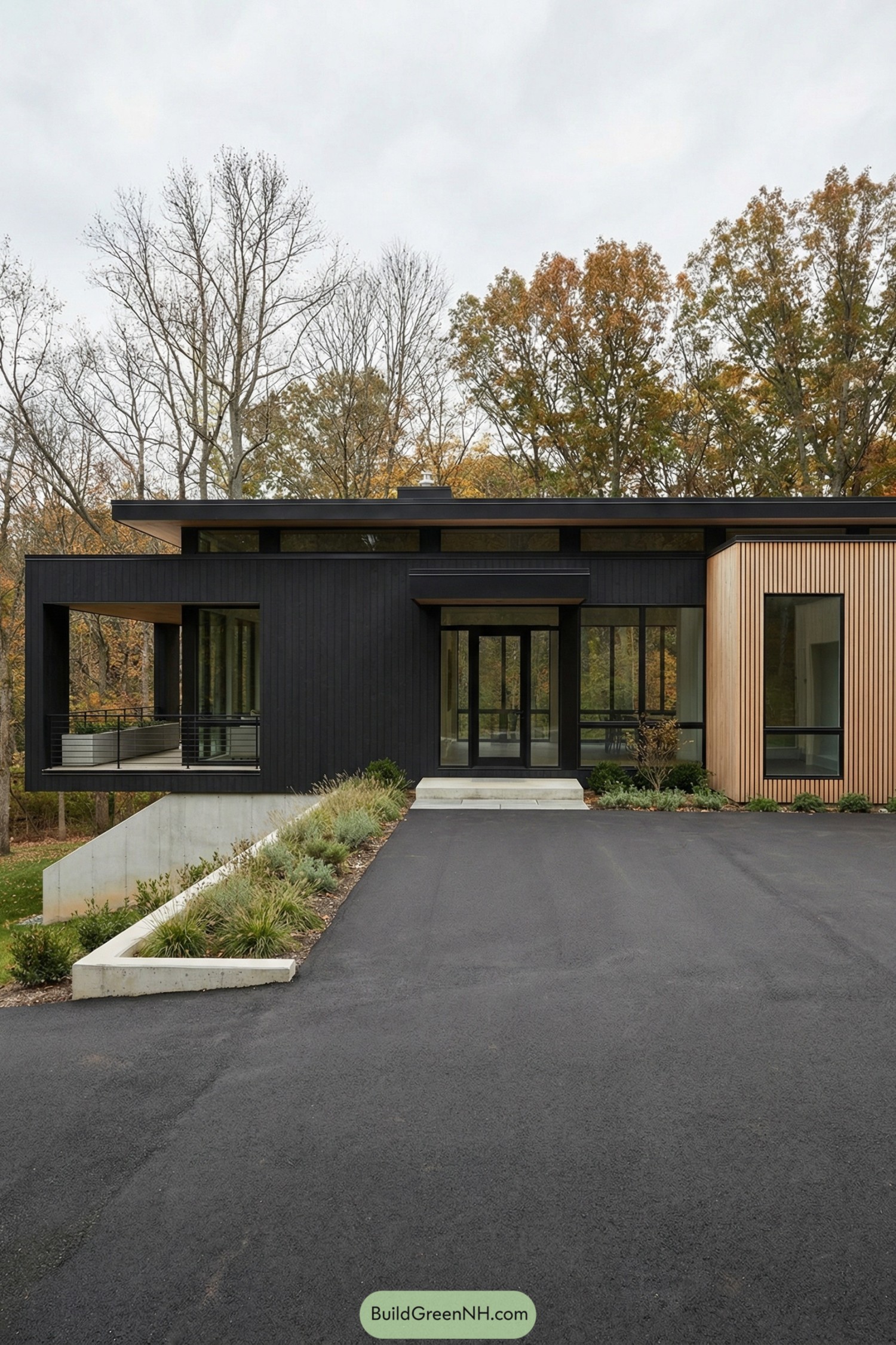 Black modern house with vertical wood accent