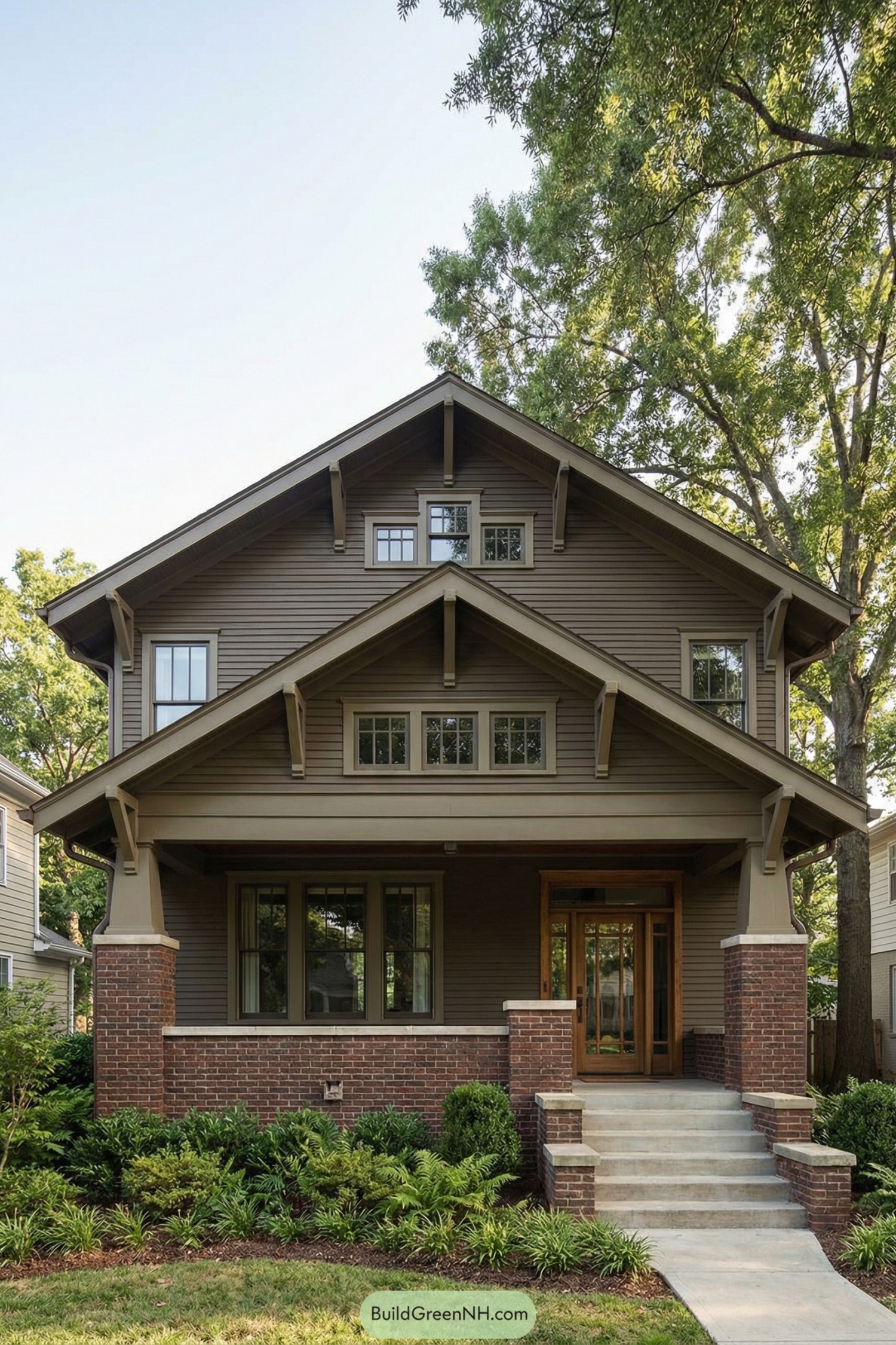 Traditional craftsman bungalow with deep porch and brick base