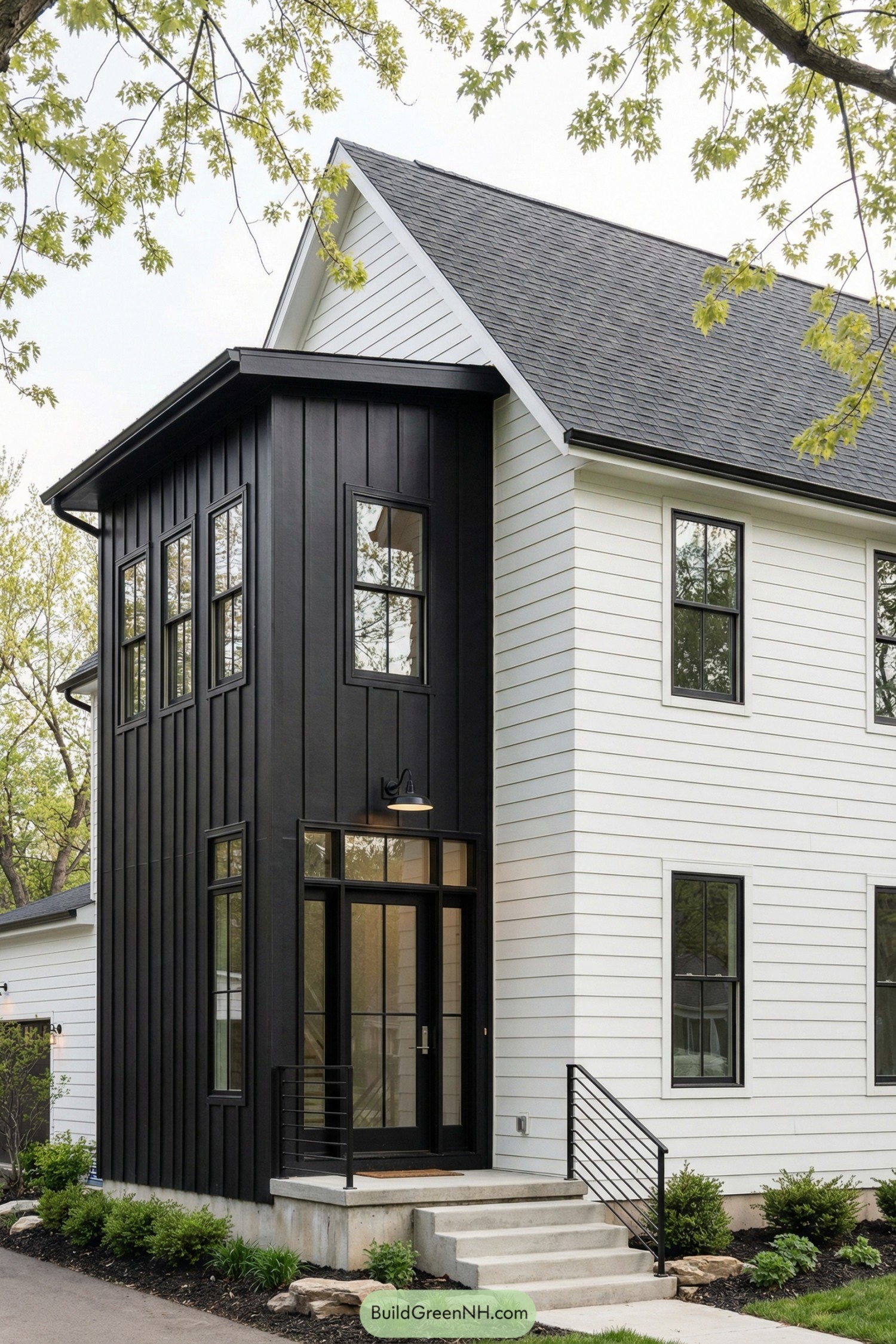 Modern white house with tall black entry