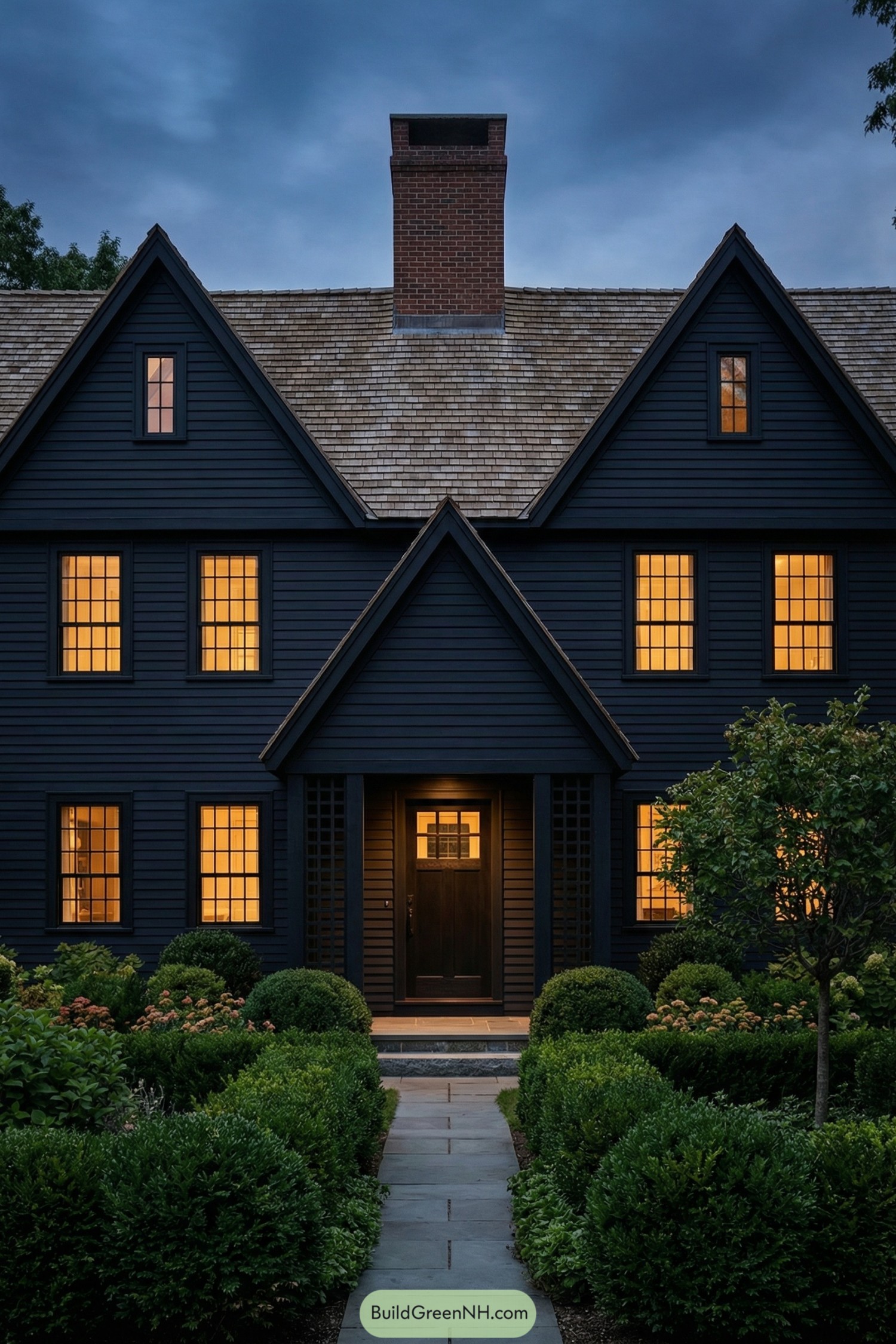 Dark gabled house with glowing windows