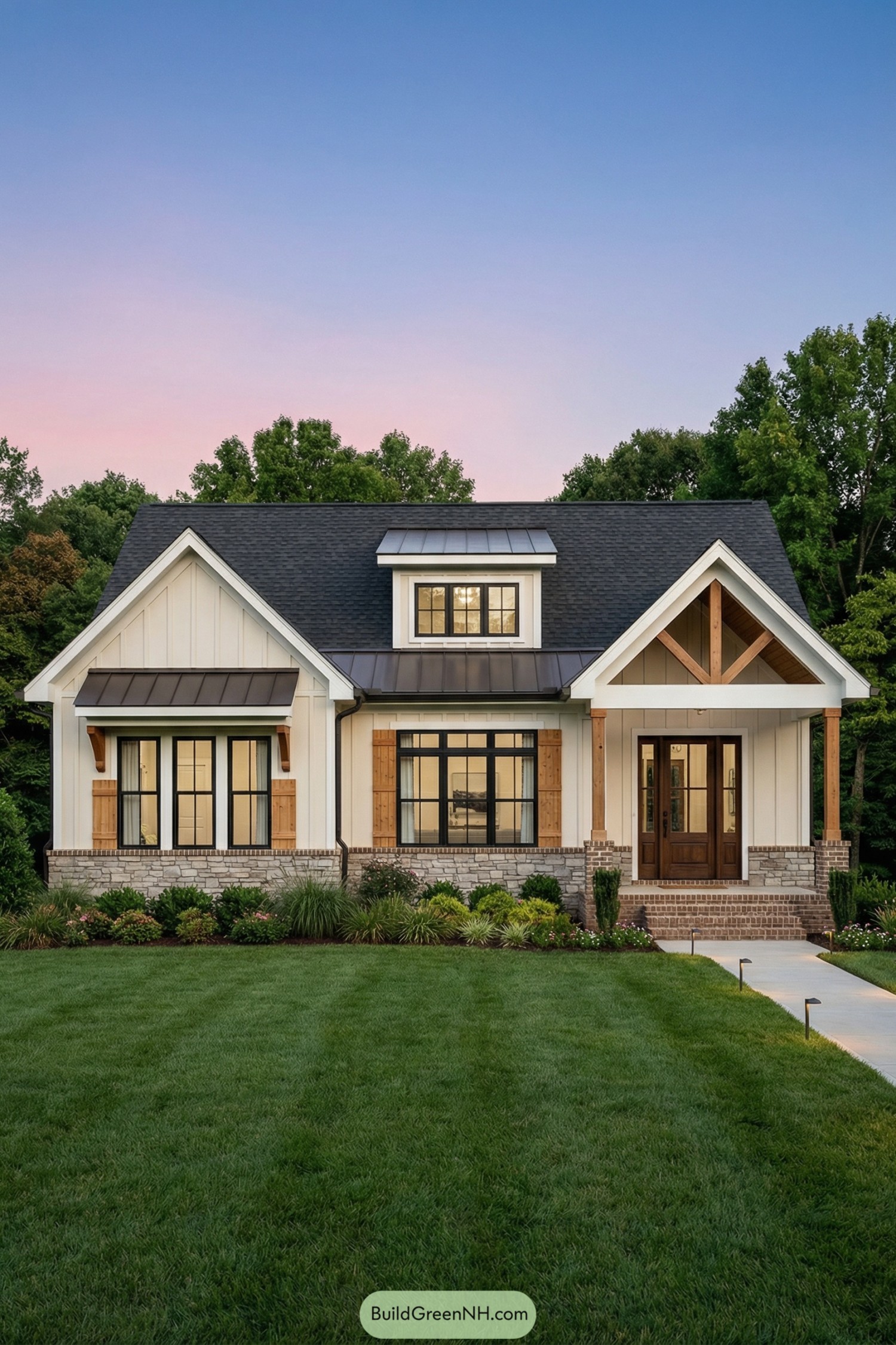 White craftsman cottage with black roof and wood accents, framed by lush lawn and shrubs