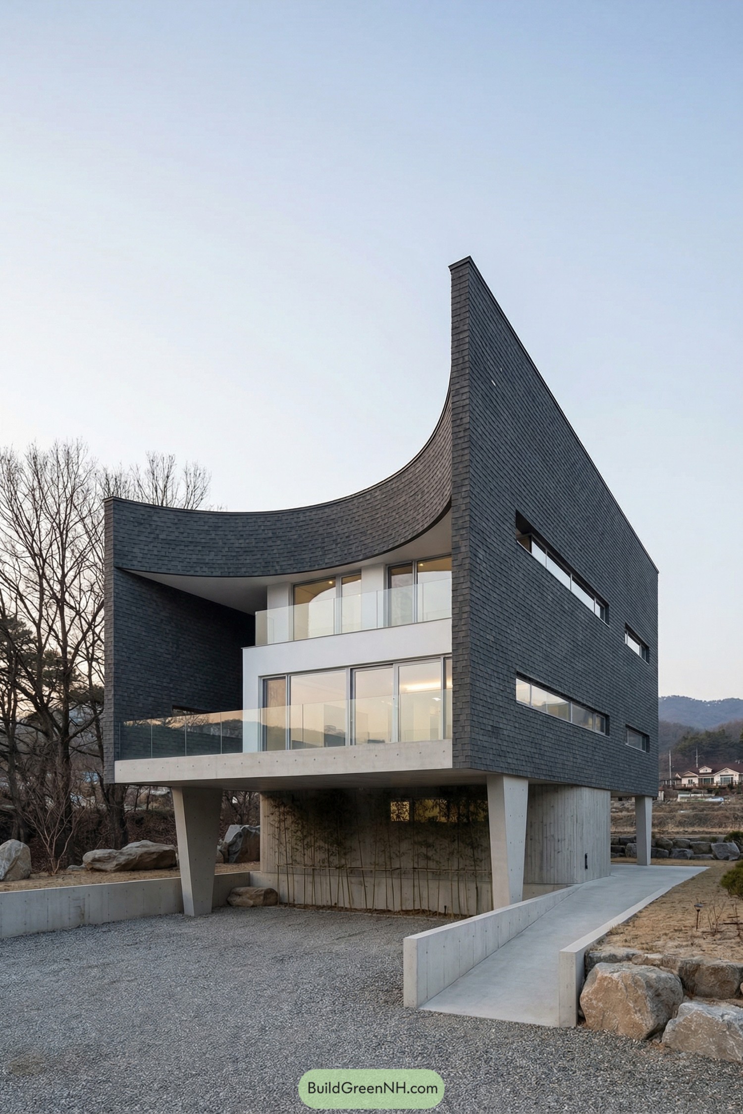 Modern house with dramatic curved slate facade