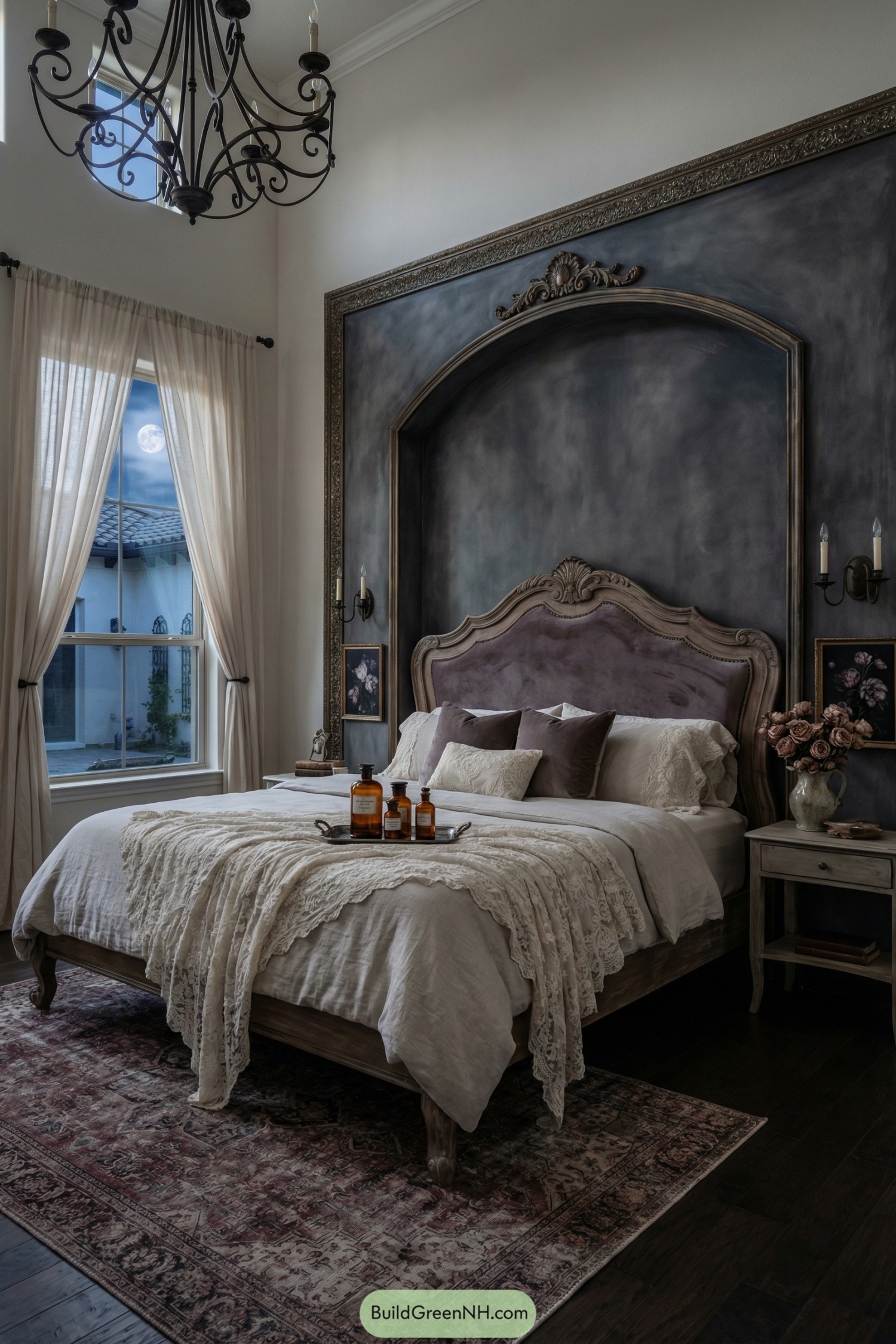 Romantic shabby chic bedroom with tufted bed, deep gray arched accent wall, and soft layered linens under a moonlit window