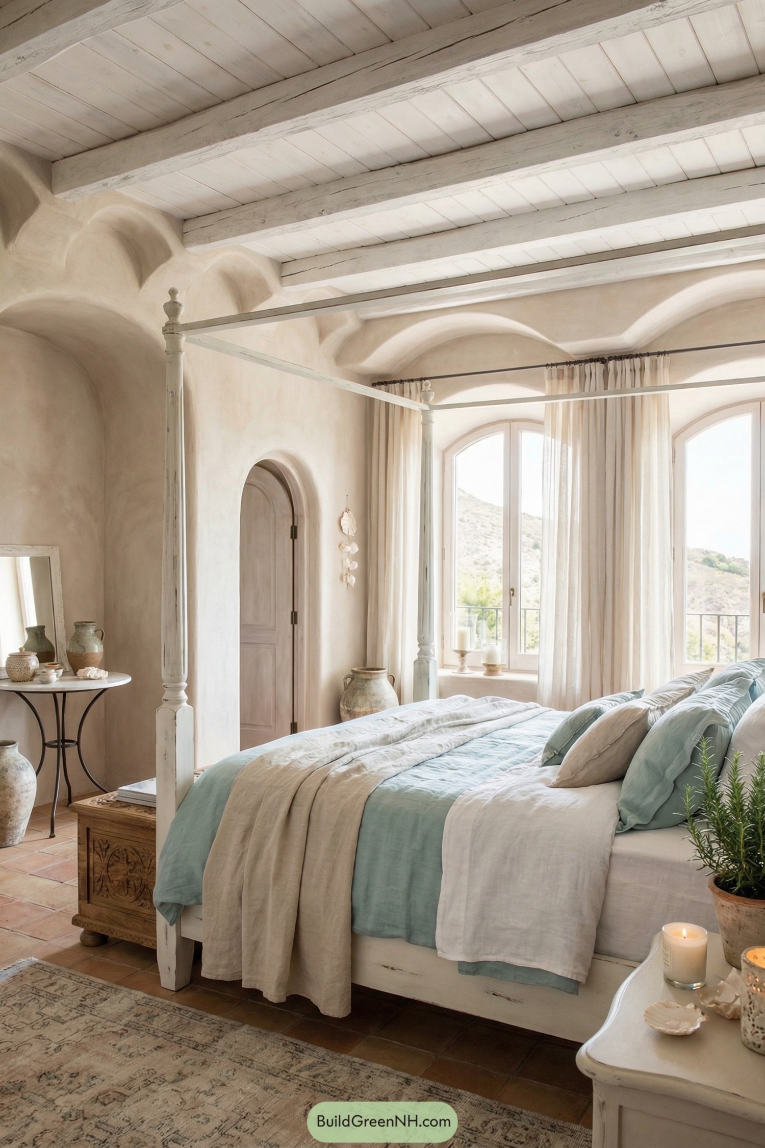 Soft neutral shabby chic bedroom with four poster bed and arched windows