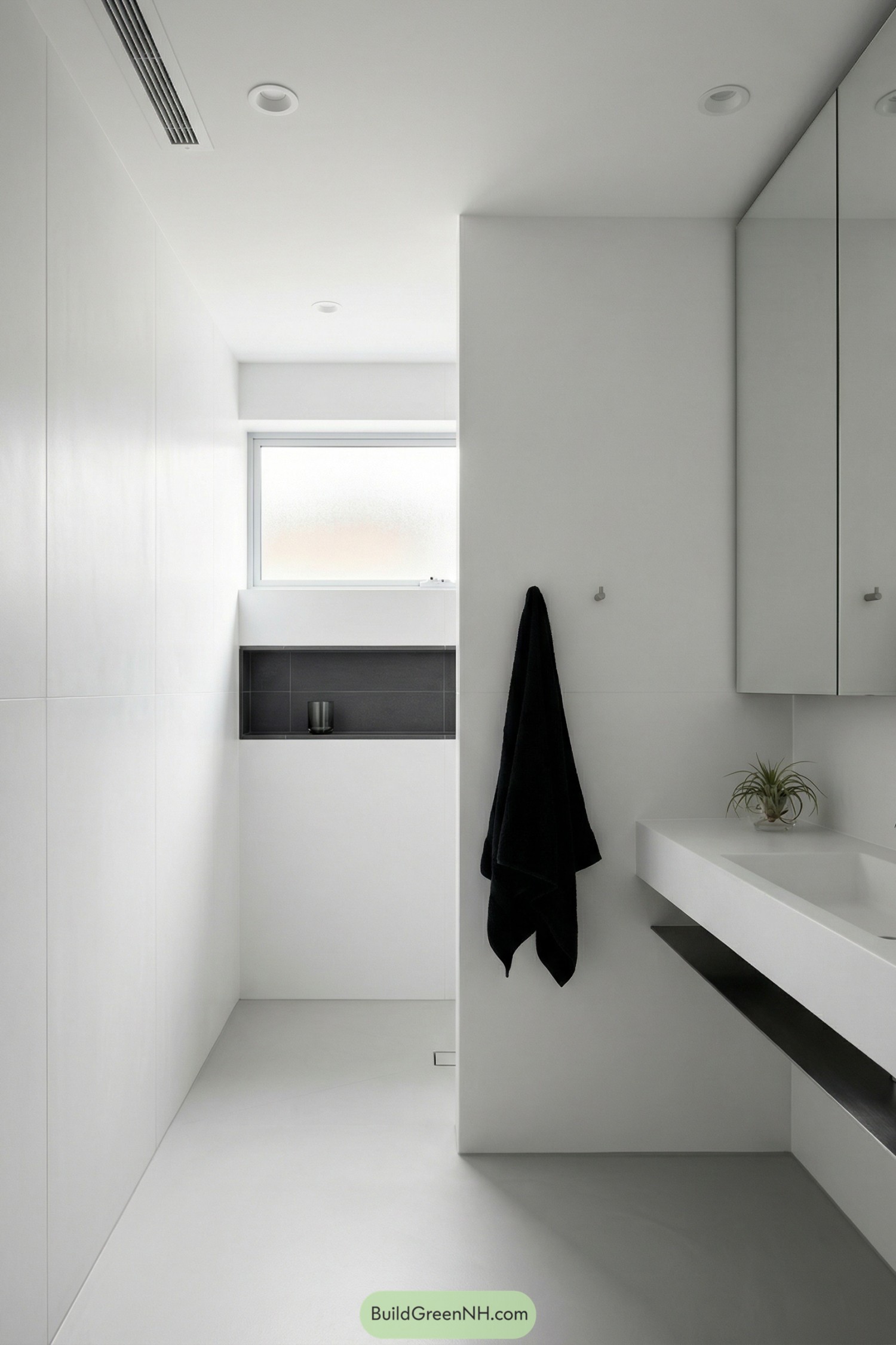 Minimal white bathroom with built in shower niche and floating vanity