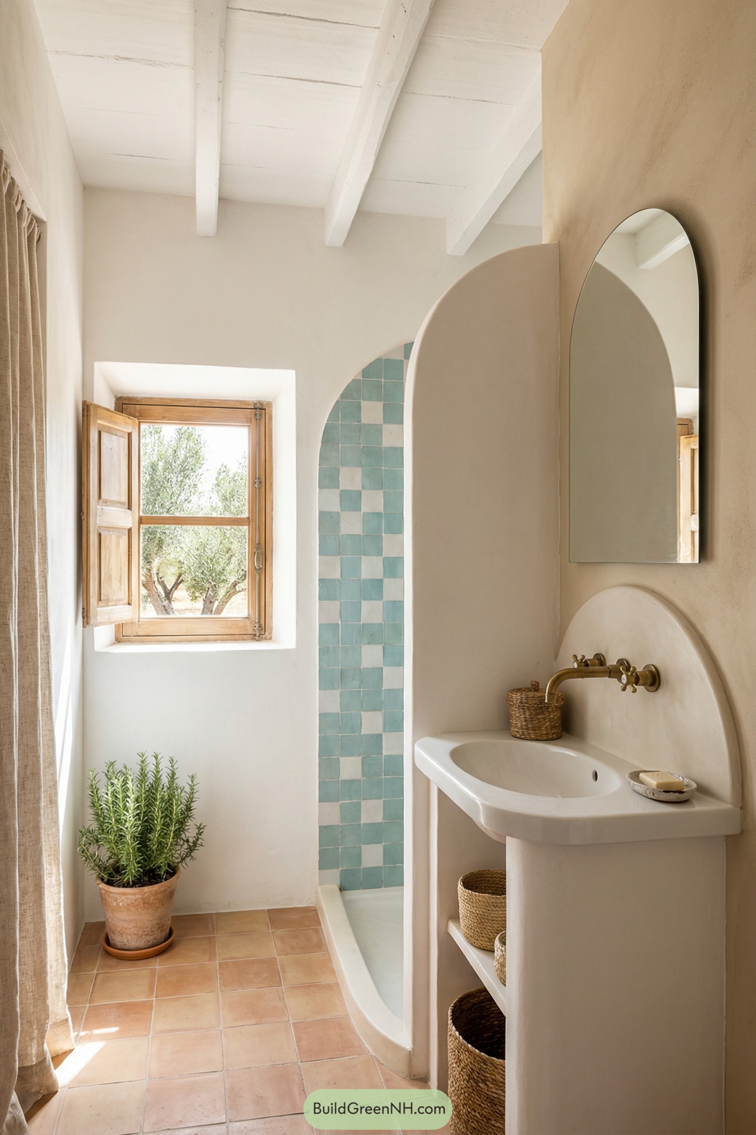 Small Mediterranean bathroom with arched aqua-tiled shower, terracotta floor, and simple white sink