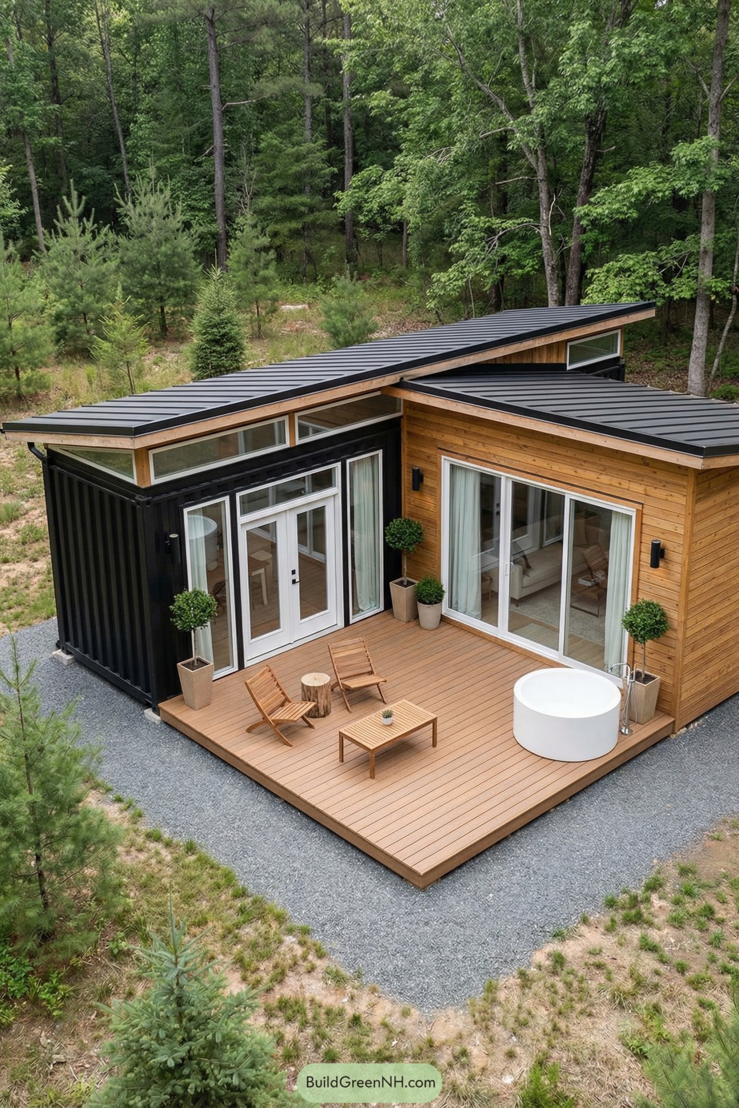Modern container home with wood deck and soaking tub in forest